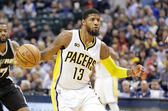 INDIANAPOLIS, IN - FEBRUARY 13:  Paul George #13 of the Indiana Pacers dribbles the ball against the San Antonio Spurs at Bankers Life Fieldhouse on February 13, 2017 in Indianapolis, Indiana.    NOTE TO USER: User expressly acknowledges and agrees that, 