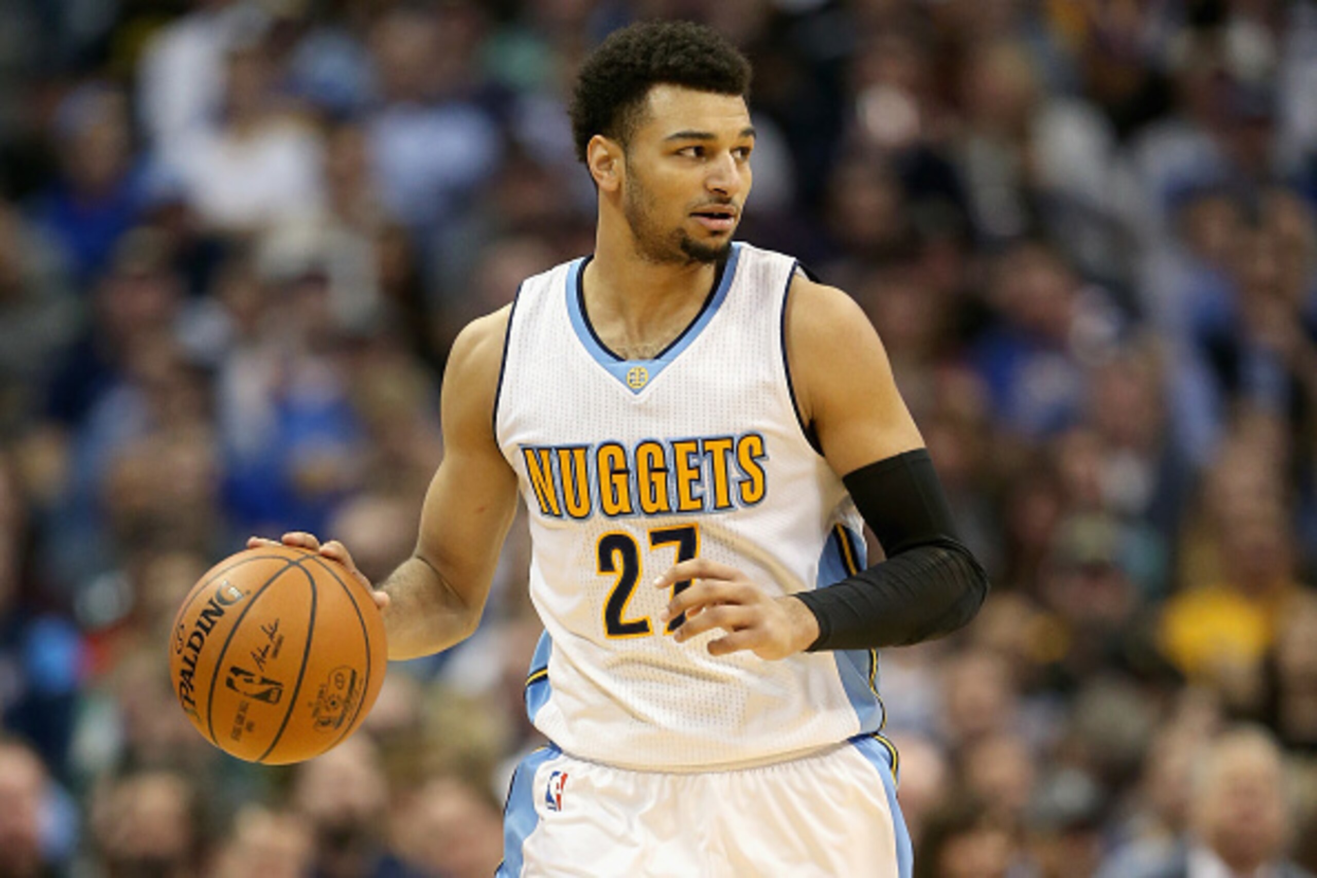 DENVER, CO - FEBRUARY 13: Jamal Murray #27 of the Denver Nuggets brings the ball down the court against the Golden State Warriors at the Pepsi Center on February 13, 2017 in Denver, Colorado. NOTE TO USER: User expressly acknowledges and agrees that , by DENVER, CO - FEBRUARY 13: Jamal Murray #27 of the Denver Nuggets brings the ball down the court against the Golden State Warriors at the Pepsi Center on February 13, 2017 in Denver, Colorado. NOTE TO USER: User expressly acknowledges and agrees that , by