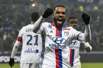 Lyon's French forward Alexandre Lacazette celebrates after scoring a goal during the French L1 football match Olympique Lyonnais (OL) vs Marseille (OM) on January 22, 2017, at the Parc Olympique Lyonnais stadium in Decines-Charpieu, central-eastern France
