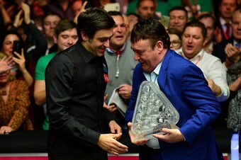 LONDON, ENGLAND - JANUARY 17:  Ronnie O'Sullivan of England is presented with The Dafabet Masters Trophy by former player Jimmy White of England during Day Eight of The Dafabet Masters at Alexandra Palace on January 17, 2016 in London, England.  (Photo by