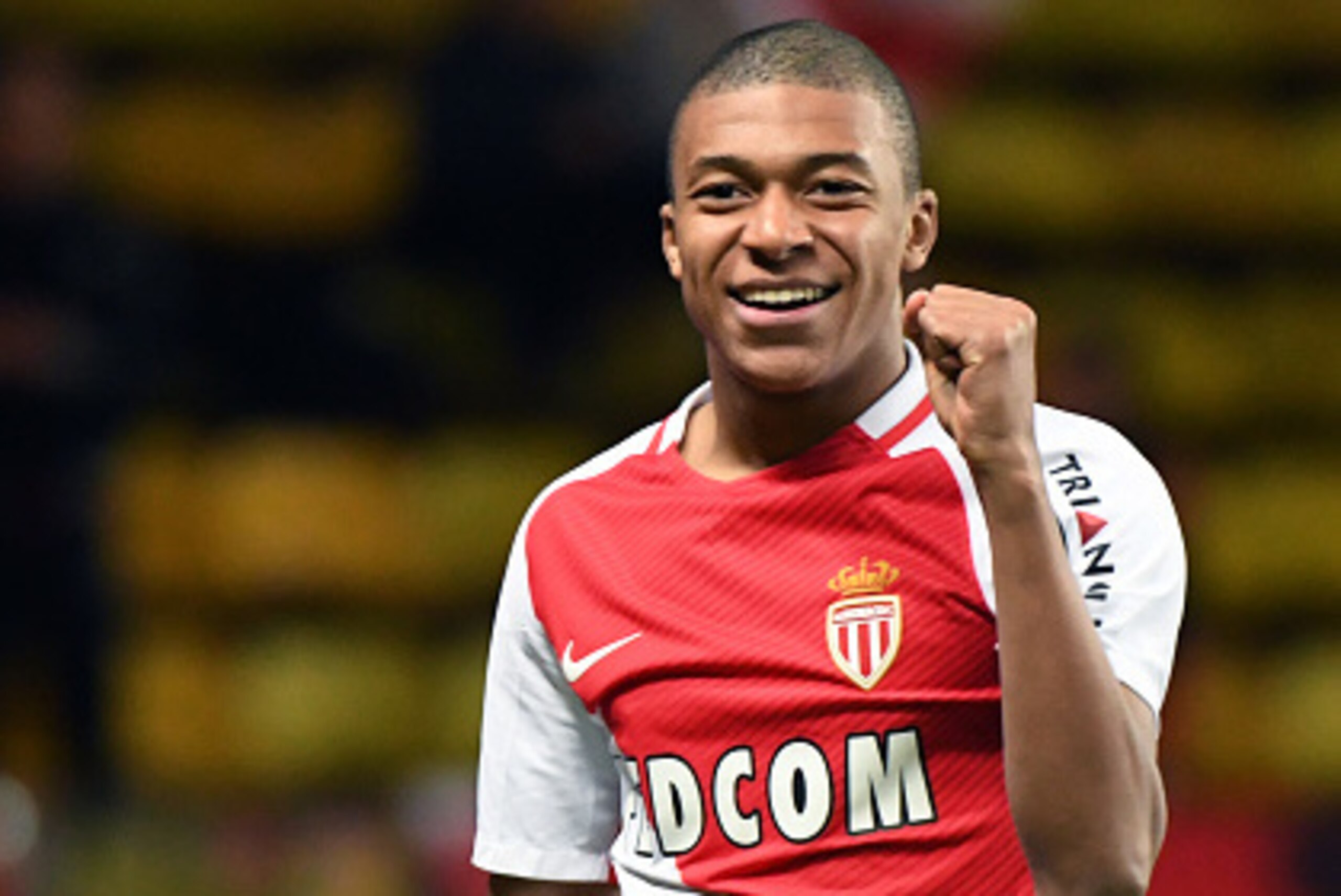 Monaco's French forward Kylian Mbappe Lottin celebrates after scoring a goal during the French Ligue 1 football match between AS Monaco and Metz (FCM) at the Louis II Stadium in Monaco on February 11, 2017. / AFP / Yann COATSALIOU (Photo credit sh Monaco's French forward Kylian Mbappe Lottin celebrates after scoring a goal during the French Ligue 1 football match between AS Monaco and Metz (FCM) at the Louis II Stadium in Monaco on February 11, 2017. / AFP / Yann COATSALIOU (Photo credit sh