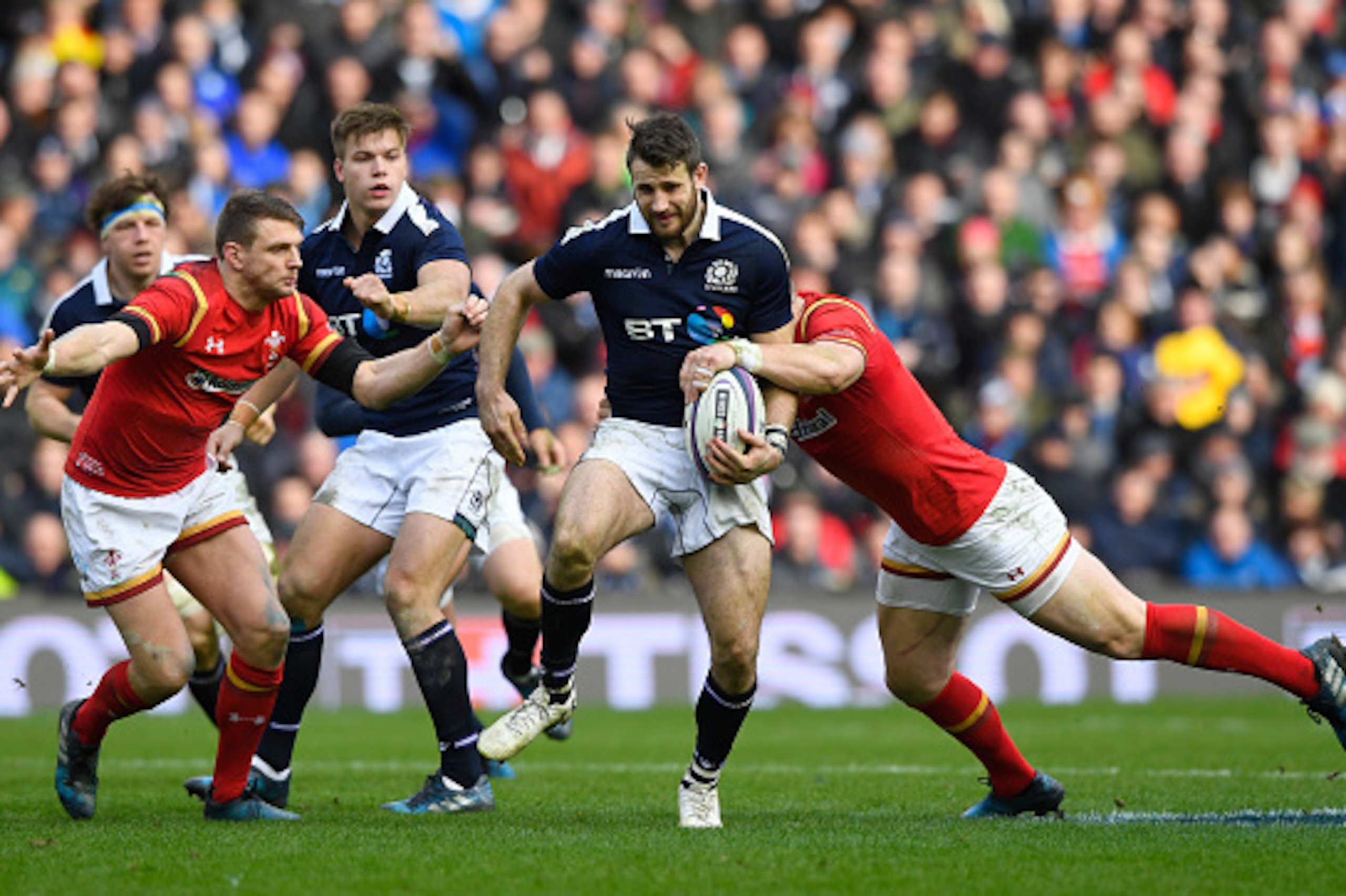 EDINBURGH, SCOTLAND - FEBRUARY 25: Tommy Seymour of Scotland is tackled by Scott Williams of Wales during the RBS Six Nations match between Scotland and Wales at Murrayfield Stadium on February 25, 2017 in Edinburgh, Scotland. (Photo by Stu Forster/Gett EDINBURGH, SCOTLAND - FEBRUARY 25: Tommy Seymour of Scotland is tackled by Scott Williams of Wales during the RBS Six Nations match between Scotland and Wales at Murrayfield Stadium on February 25, 2017 in Edinburgh, Scotland. (Photo by Stu Forster/Gett