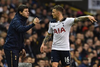Tottenham Hotspur's Argentinian head coach Mauricio Pochettino gives instructions to Tottenham Hotspur's English defender Kieran Trippier (R) during the English FA Cup third round football match between Tottenham Hotspur and Aston Villa at White Hart Lane
