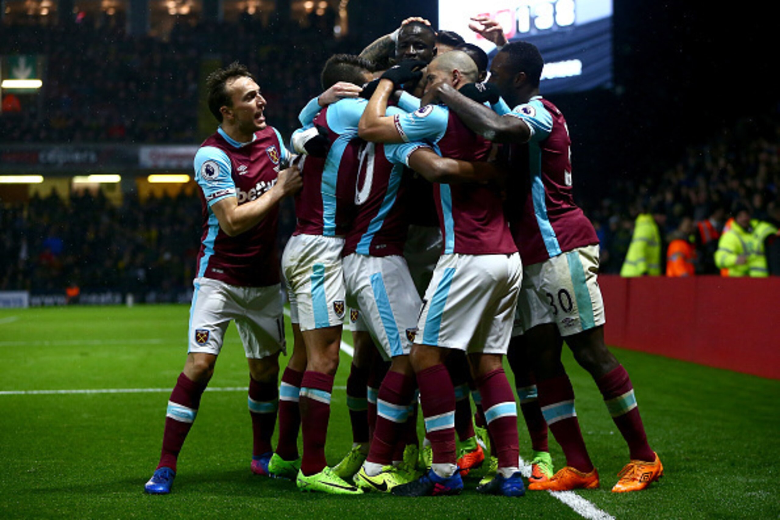 WATFORD, ENGLAND - FEBRUARY 25:  Andre Ayew of West Ham United celebrates with team mates after scoring his sides first goal during the Premier League match between Watford and West Ham United at Vicarage Road on February 25, 2017 in Watford, England.  (P