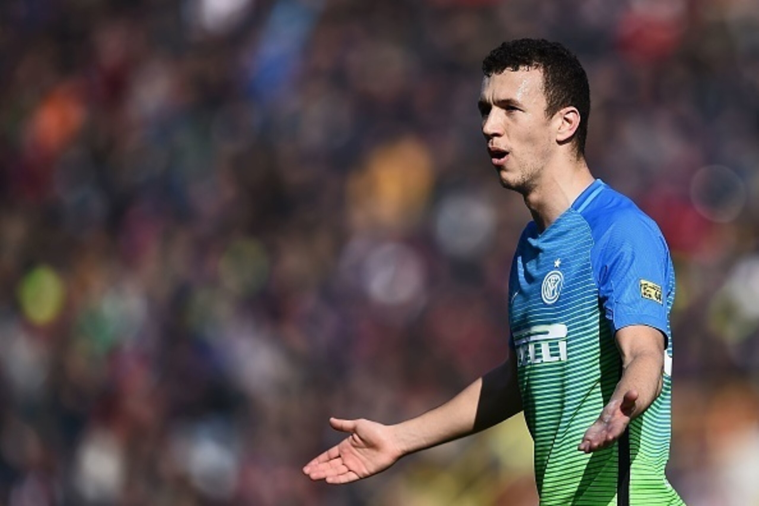 Inter Milan's Croatian forward Ivan Perisic reacts during the Italian Serie A football match Bologna vs Inter-Milan at the Dall'Ara Stadium in Bologna on Febuary 19, 2017.   / AFP / FILIPPO MONTEFORTE        (Photo credit should read FILIPPO MONTEFORTE/AF