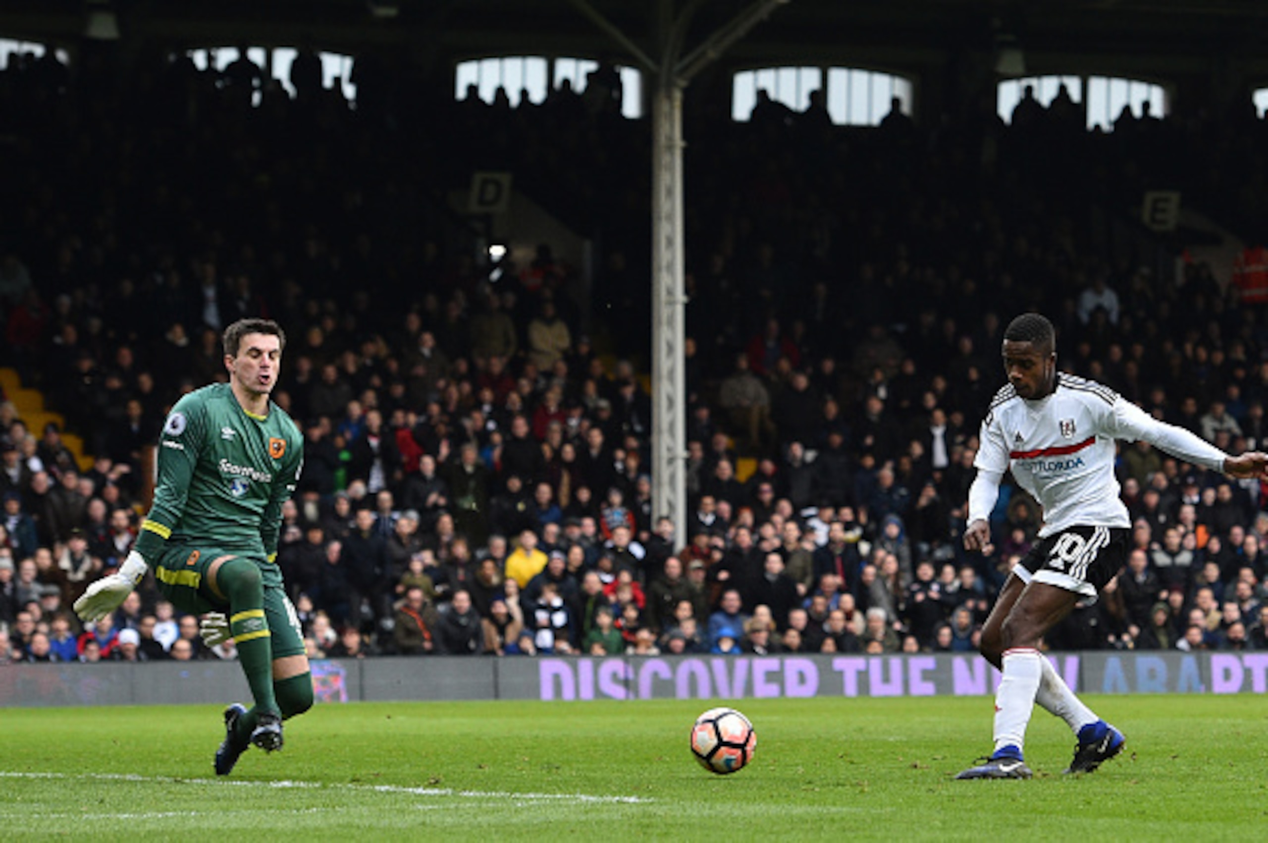 Fulham's English defender Ryan Sessegnon (R) scores their third goal during the English FA Cup fourth round football match between Fulham and Hull City at Craven Cottage in London on January 29, 2017. / AFP / Glyn KIRK / RESTRICTED TO EDITORIAL USE. No us
