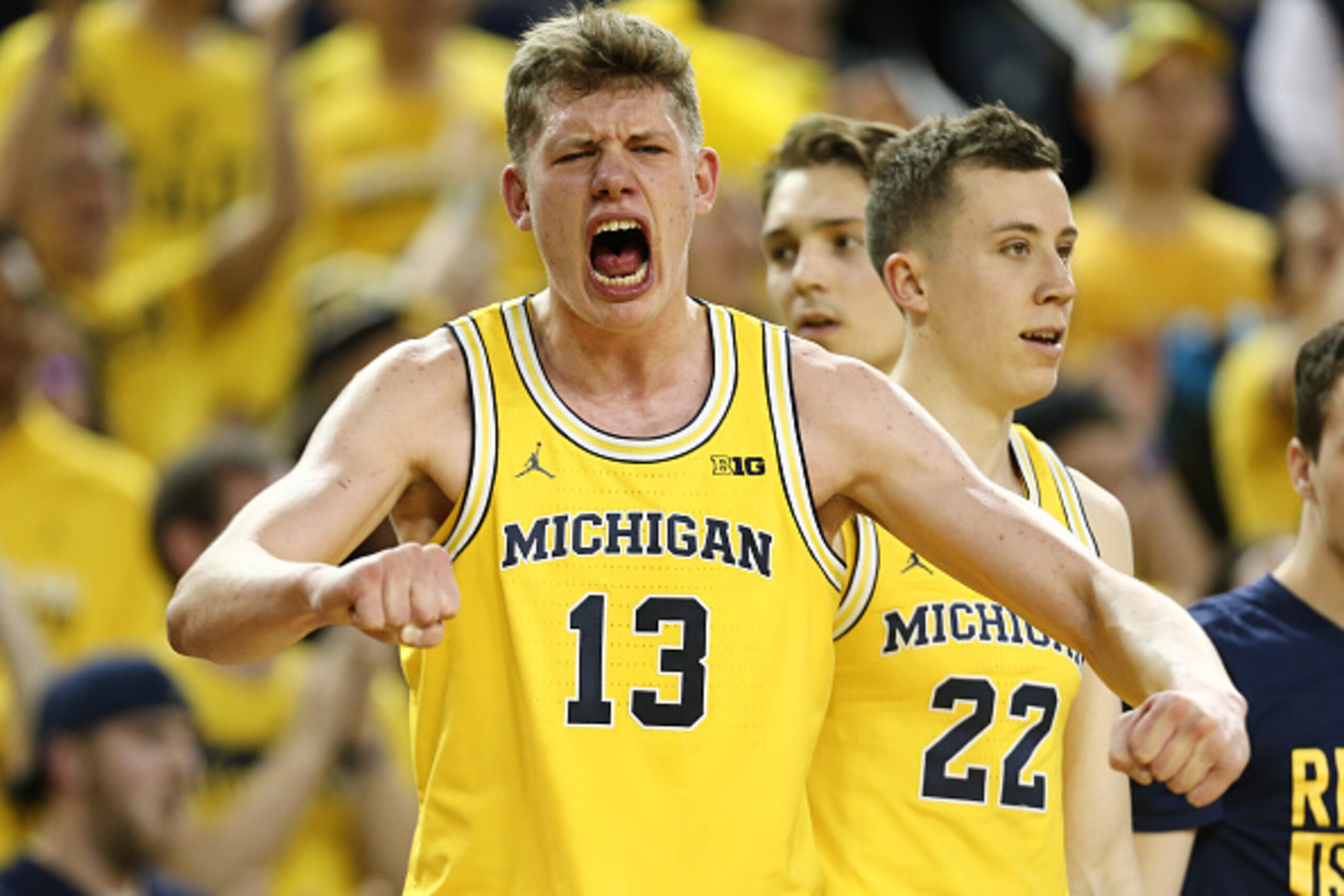 EAST LANSING, MI - FEBRUARY 7:  Moritz Wagner #13 of the Michigan Wolverines celebrates from the bench late in the second half against the Michigan State Spartans at Crisler Arena on February 7, 2017 in Ann Arbor, Michigan. (Photo by Rey Del Rio/Getty Ima