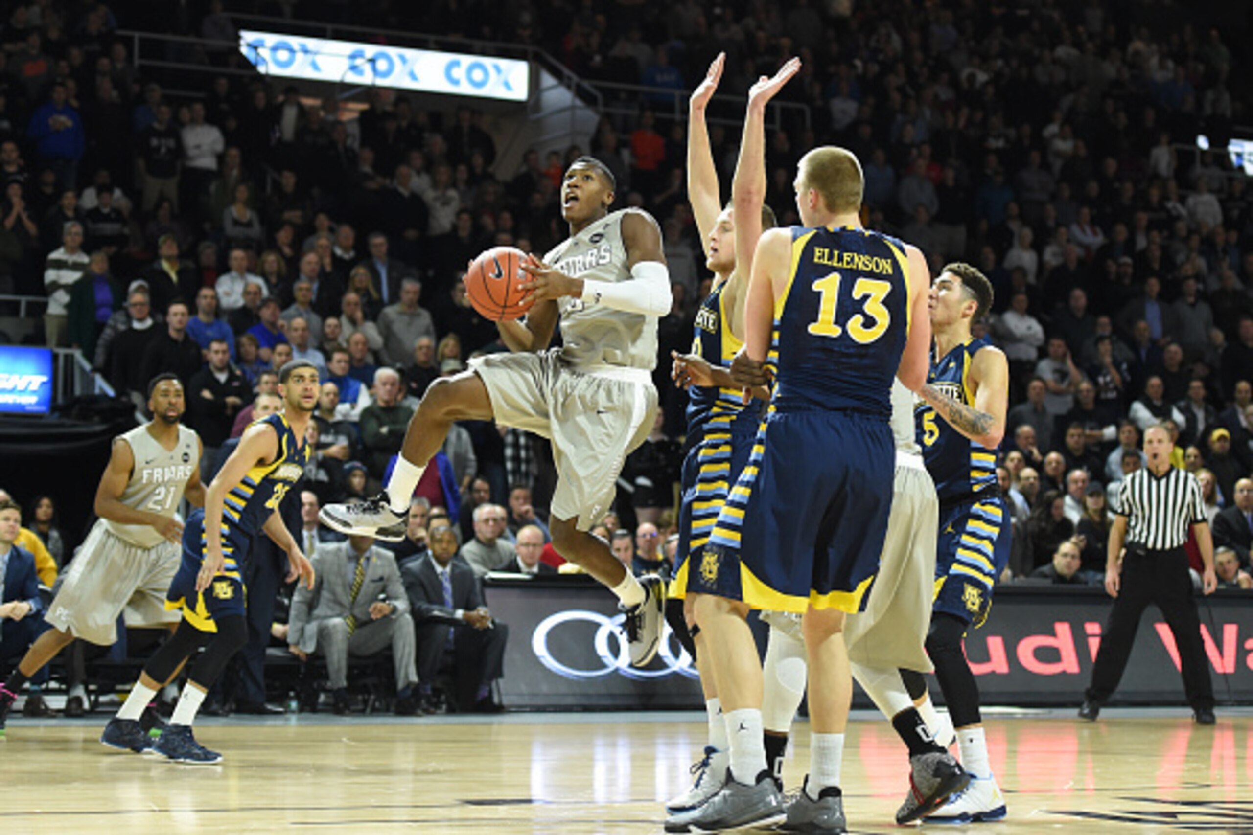 PROVIDENCE, RI - JANUARY 05:  Kris Dunn #3 of the Providence Friars drives to the basket during a college basketball game against the Marquette Golden Eagles at Dunkin' Donuts Center on January 5, 2016 in Providence, Rhode Island.  The Golden Eagles won 6
