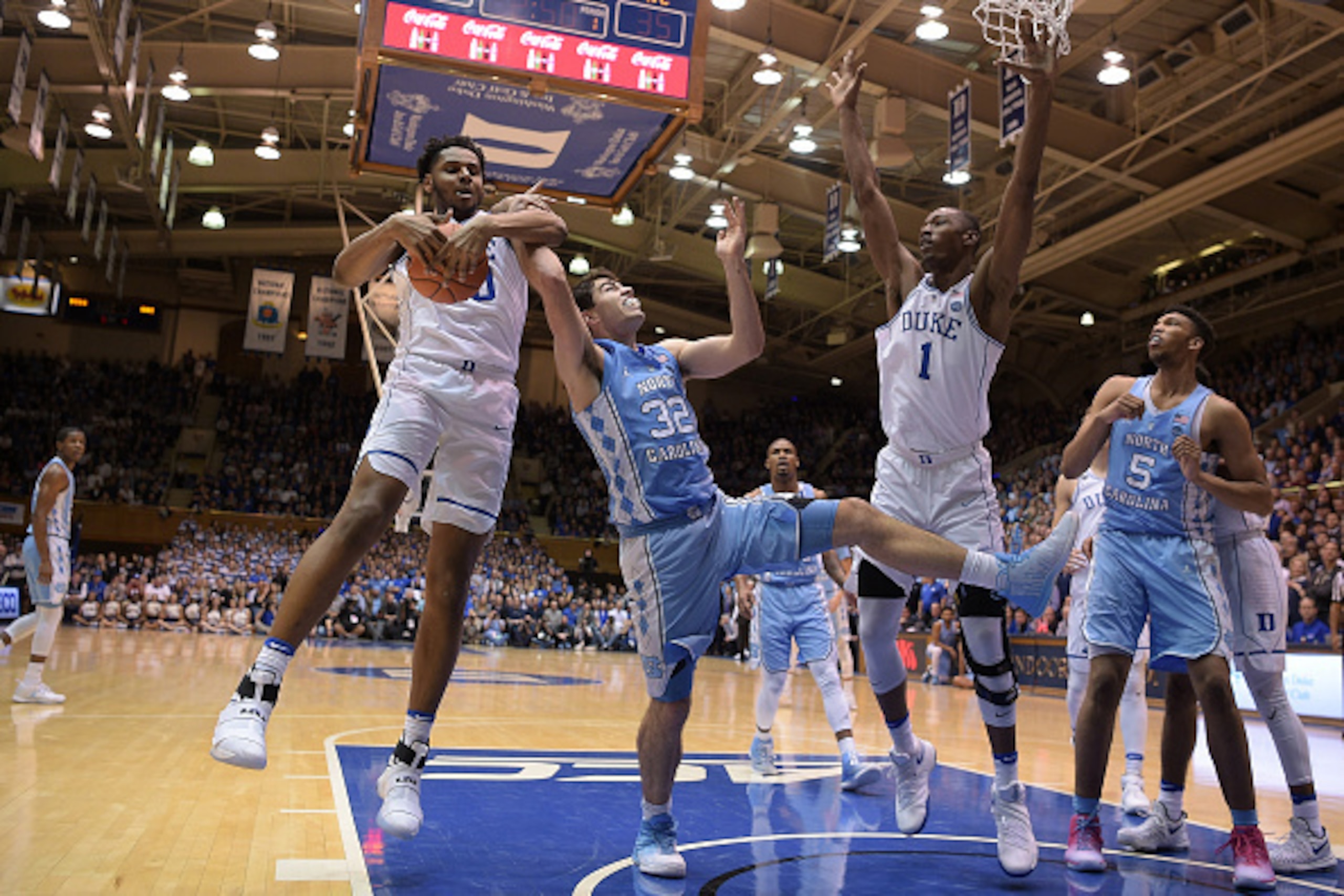 DURHAM, NC - FEBRUARY 09: Marques Bolden #20 of the Duke Blue Devils blocks a shot by Luke Maye #32 of the North Carolina Tar Heels at Cameron Indoor Stadium on February 9, 2017 in Durham, North Carolina. (Photo by Lance King/Getty Images)