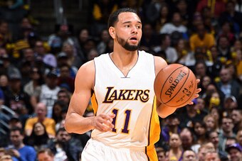 LOS ANGELES, CA - FEBRUARY 26: Tyler Ennis #11 of the Los Angeles Lakers brings the ball up court during the game against the San Antonio Spurs on February 26, 2017 at STAPLES Center in Los Angeles, California. NOTE TO USER: User expressly acknowledges an