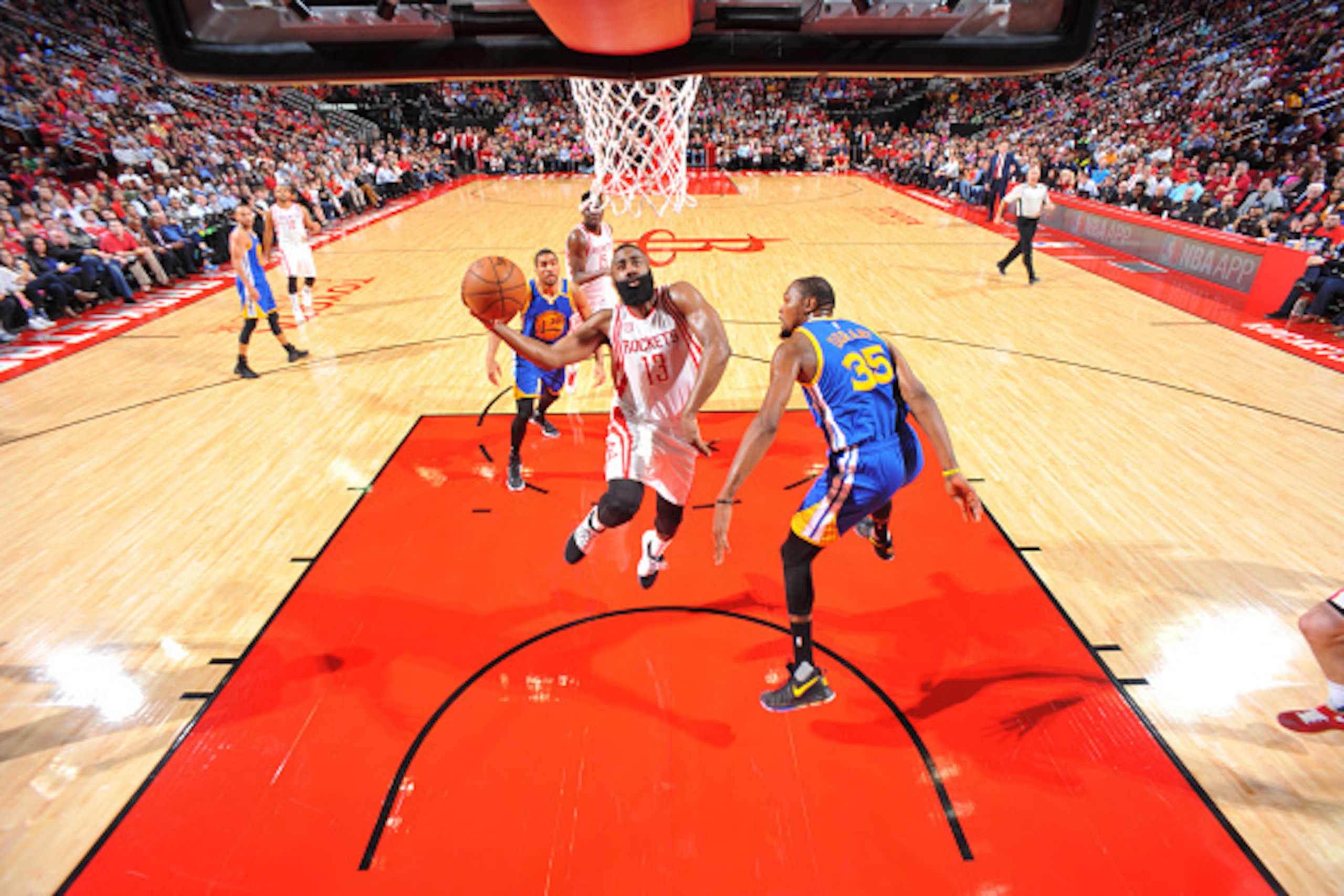 HOUSTON, TX - JANUARY 20:  James Harden #13 of the Houston Rockets goes up for a shot during a game against the Golden State Warriors on January 20, 2017 at the Toyota Center in Houston, Texas. NOTE TO USER: User expressly acknowledges and agrees that, by