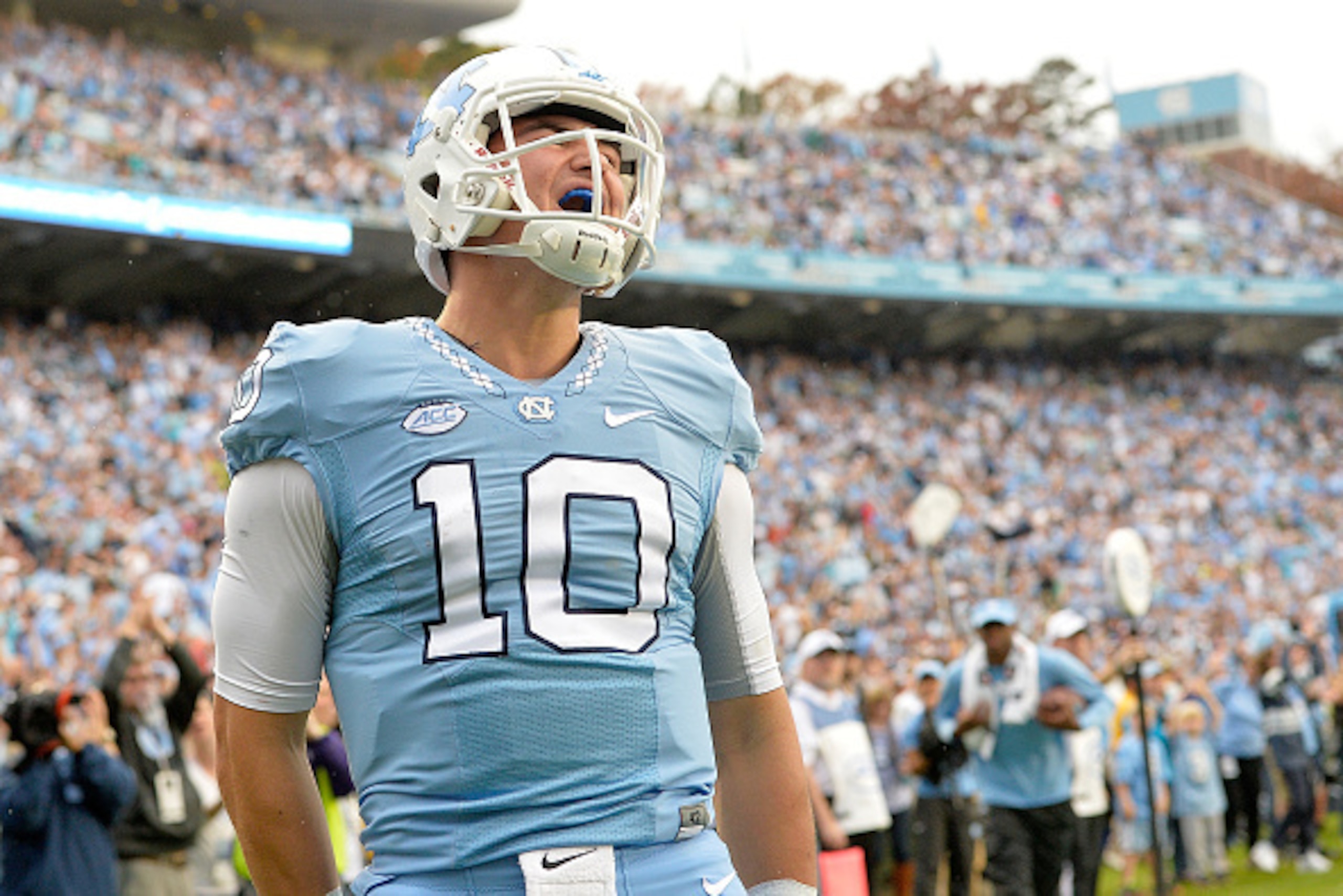 CHAPEL HILL, NC - NOVEMBER 07:  Mitch Trubisky #10 of the North Carolina Tar Heels reacts after scoring a touchdown against the Duke Blue Devils during their game at Kenan Stadium on November 7, 2015 in Chapel Hill, North Carolina. North Carolina won 66-3
