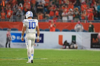 MIAMI GARDENS, FL - OCTOBER 15:  Mitch Trubisky #10 of the North Carolina Tar Heels looks on during a game against the Miami Hurricanes at Hard Rock Stadium on October 15, 2016 in Miami Gardens, Florida.  (Photo by Mike Ehrmann/Getty Images)