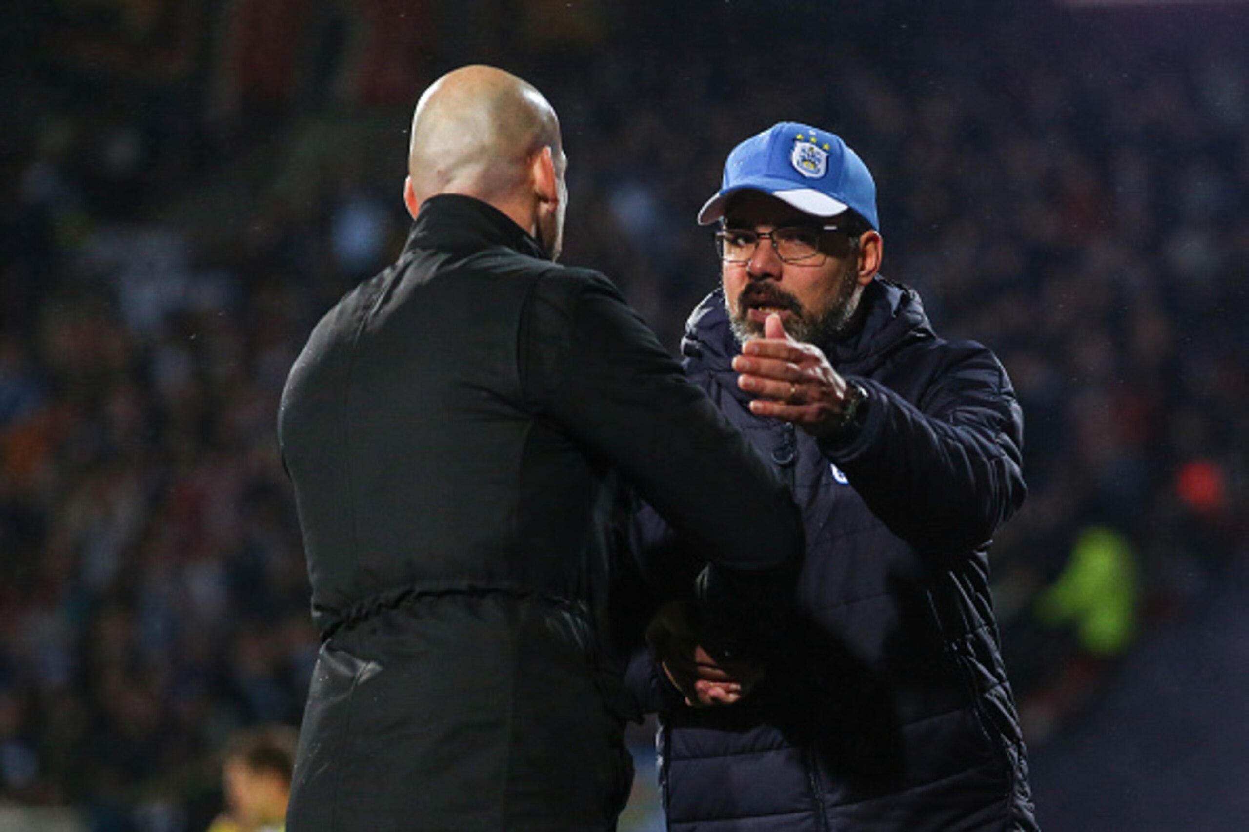 HUDDERSFIELD, ENGLAND - FEBRUARY 21: Jaap Stam head coach / manager of Reading and David Wagner head coach / manager  of Huddersfield Town shake hands at full time during the Sky Bet Championship match between Huddersfield Town and Reading at The John Smi