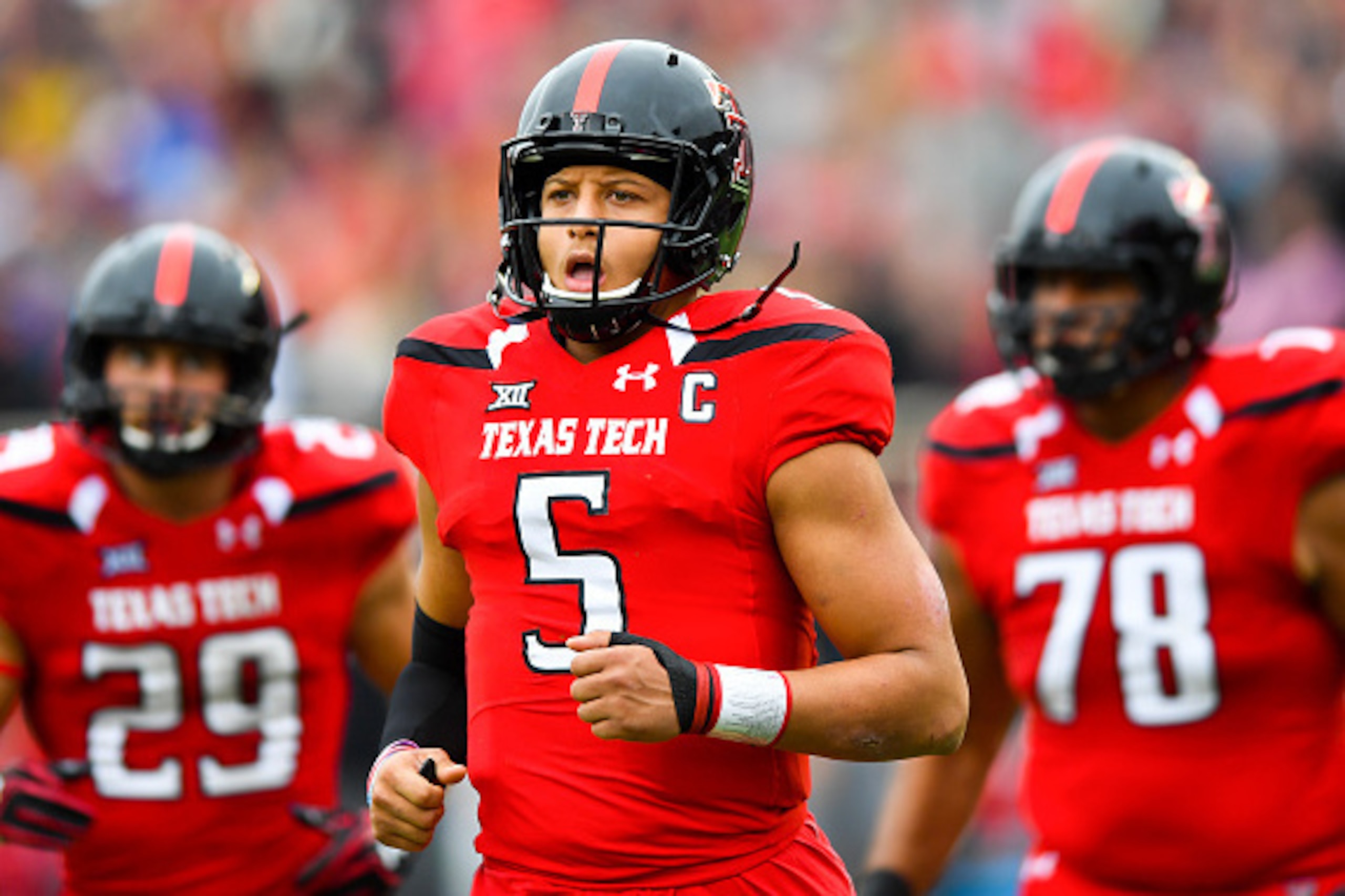 LUBBOCK, TX - NOVEMBER 05: Patrick Mahomes II #5 of the Texas Tech Red Raiders leads the offense on to the field during the game against the Texas Longhorns on November 5, 2016 at AT&T Jones Stadium in Lubbock, Texas. Texas defeated Texas Tech 45-37. (Pho