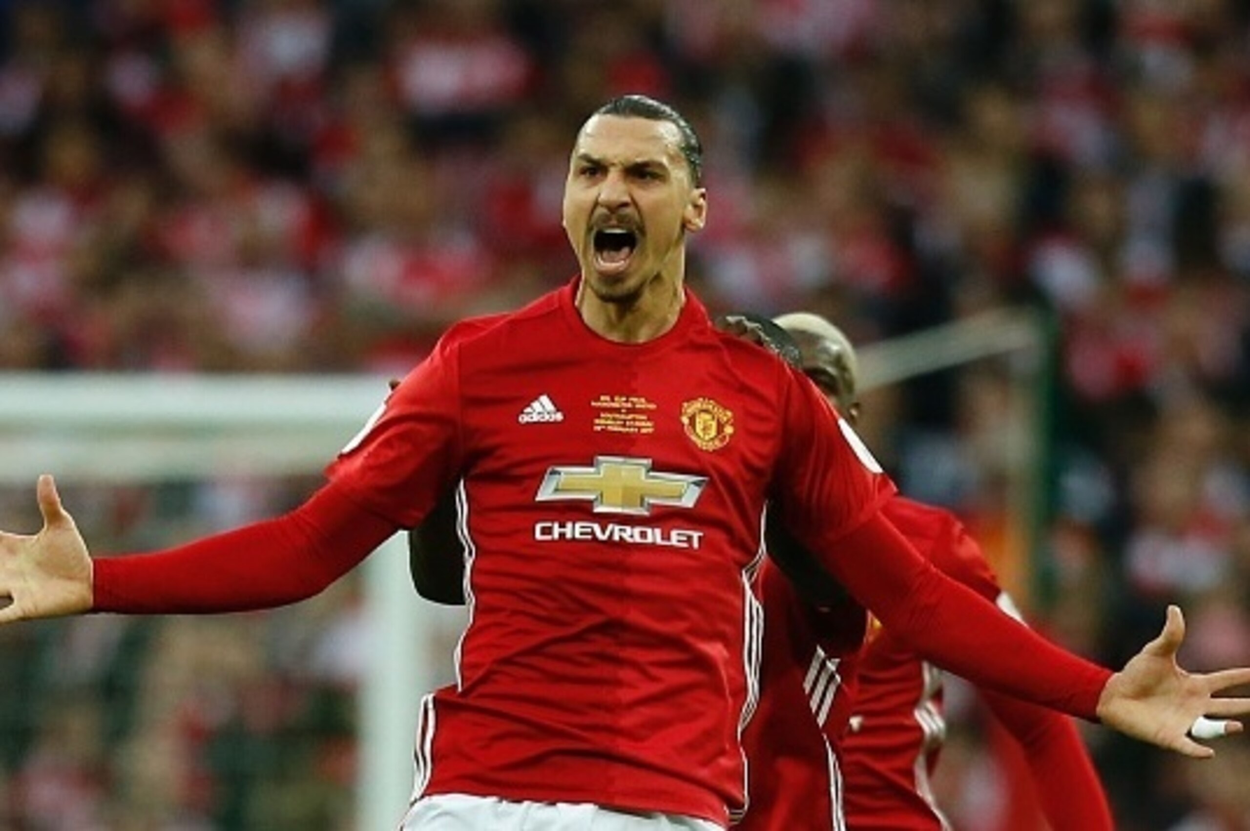 Manchester United's Swedish striker Zlatan Ibrahimovic (C) celebrates scoring the opening goal during the English League Cup final football match between Manchester United and Southampton at Wembley stadium in north London on February 26, 2017. / AFP / Ia