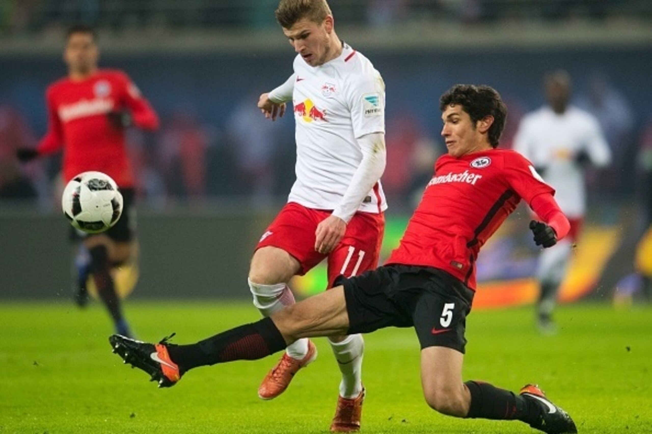 Leipzig´s striker Timo Werner (L) and Eintracht Frankfurt's Spanish defender Jesus Vallejo vie for the ball during the German first division Bundesliga football match between RB Leipzig and Eintracht Frankfurt in Leipzig, eastern Germany on January 21, 20