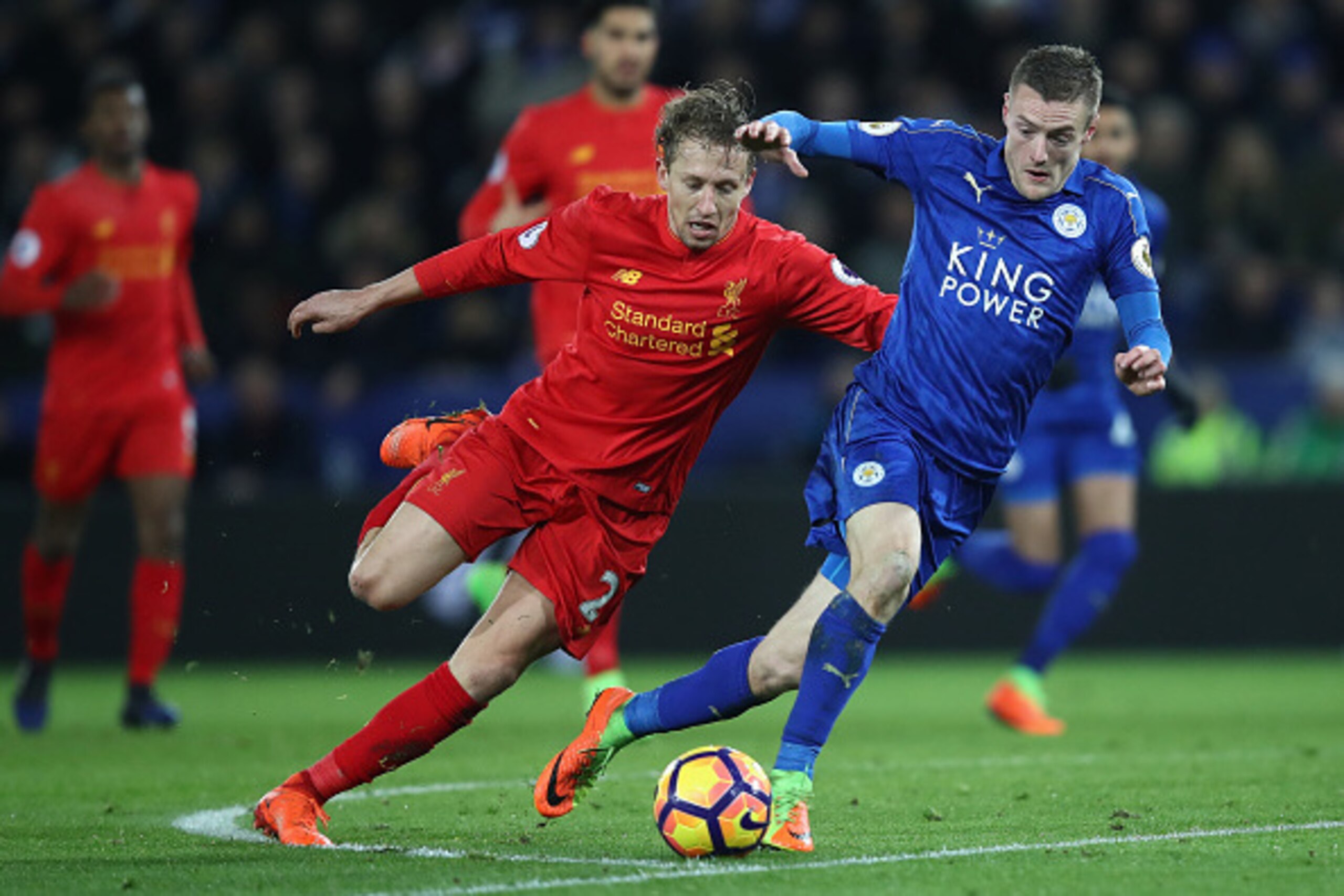 LEICESTER, ENGLAND - FEBRUARY 27:  Lucas of Liverpool battles for the ball with Jamie Vardy of Leicester during the Premier League match between Leicester City and Liverpool at The King Power Stadium on February 27, 2017 in Leicester, England.  (Photo by 
