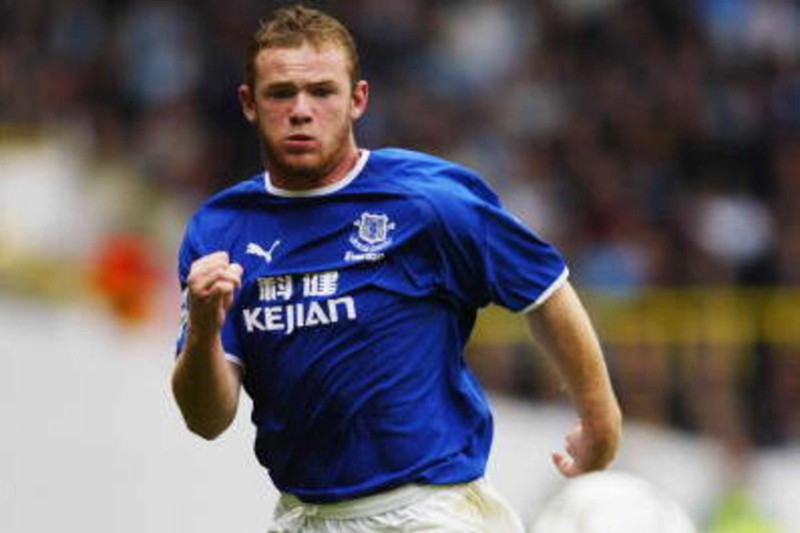 LONDON - OCTOBER 4: Wayne Rooney of Everton watches the ball during the FA Barclaycard Premiership match between Tottenham Hotspur and Everton on October 4, 2003 at White Hart Lane in London, England. Tottenham Hotspur won the match 3-0. (Photo by Clive LONDON - OCTOBER 4: Wayne Rooney of Everton watches the ball during the FA Barclaycard Premiership match between Tottenham Hotspur and Everton on October 4, 2003 at White Hart Lane in London, England. Tottenham Hotspur won the match 3-0. (Photo by Clive
