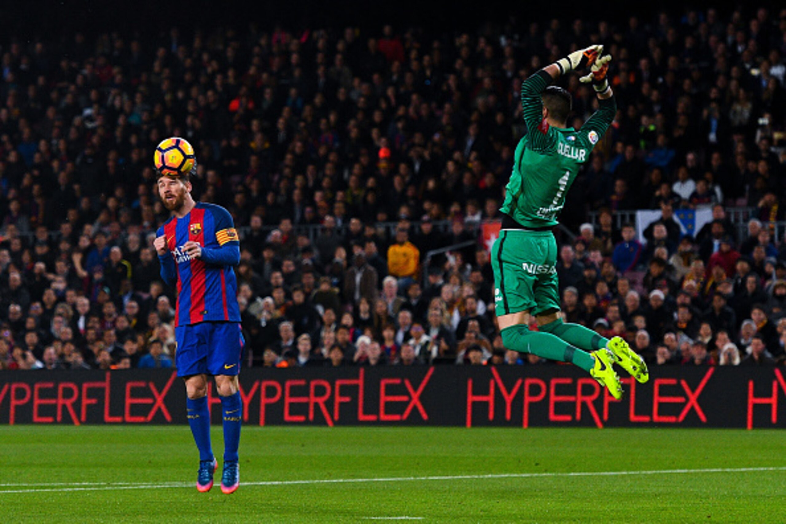 BARCELONA, SPAIN - MARCH 01: Lionel Messi of FC Barcelona scores the opening goal past Ivan Cuellar of Real Sporting de Gijon during the La Liga match between FC Barcelona and Real Sporting de Gijon at Camp Nou stadium on March 1, 2017 in Barcelona, Spai BARCELONA, SPAIN - MARCH 01: Lionel Messi of FC Barcelona scores the opening goal past Ivan Cuellar of Real Sporting de Gijon during the La Liga match between FC Barcelona and Real Sporting de Gijon at Camp Nou stadium on March 1, 2017 in Barcelona, Spai