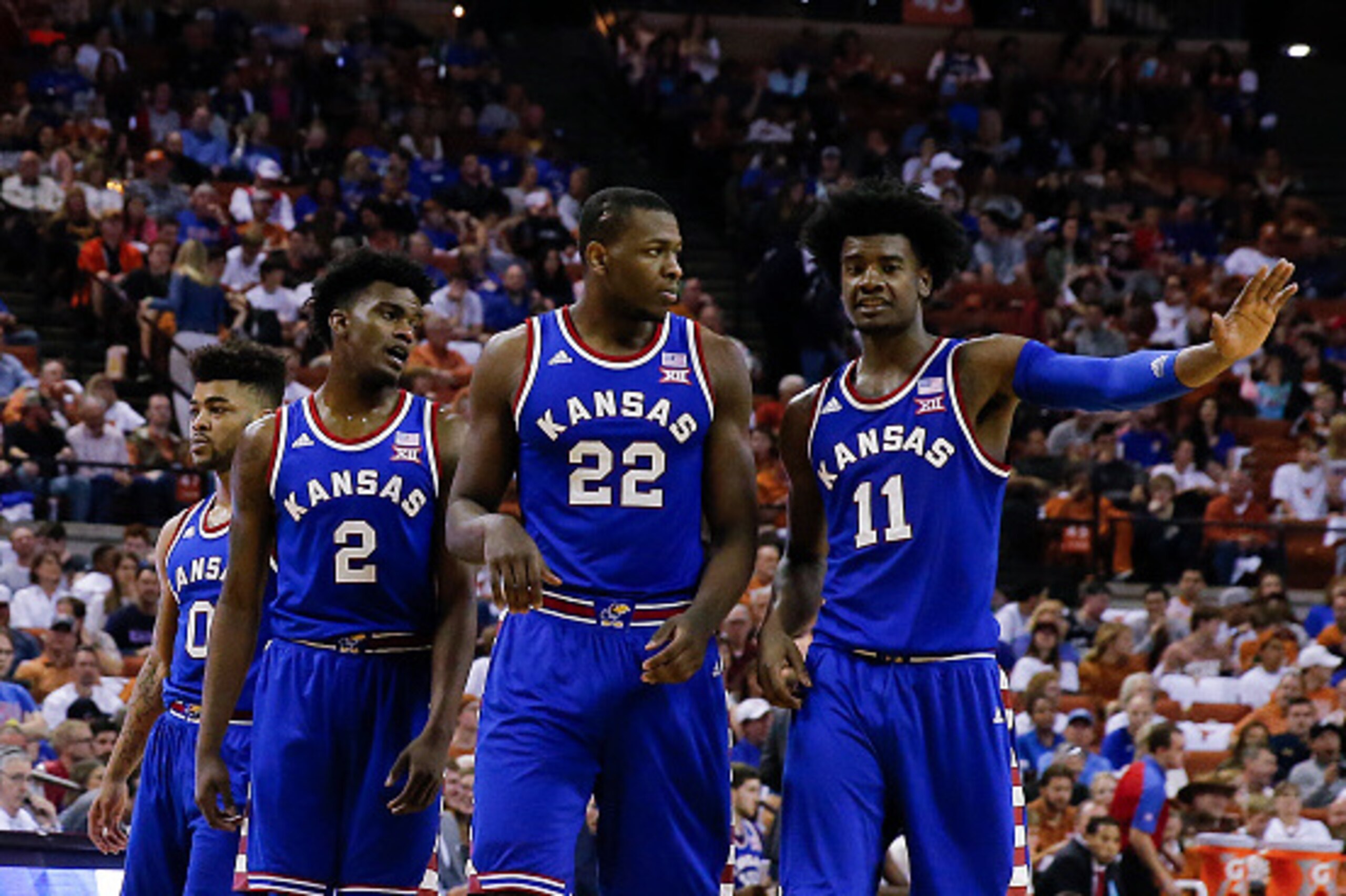 AUSTIN, TX - FEBRUARY 25: Frank Mason III #0, Lagerald Vick #2, Dwight Coleby #22 and Josh Jackson #11 of the Kansas Jayhawks stand on the court against the Texas Longhorns at the Frank Erwin Center on February 25, 2017 in Austin, Texas. (Photo by Chris C
