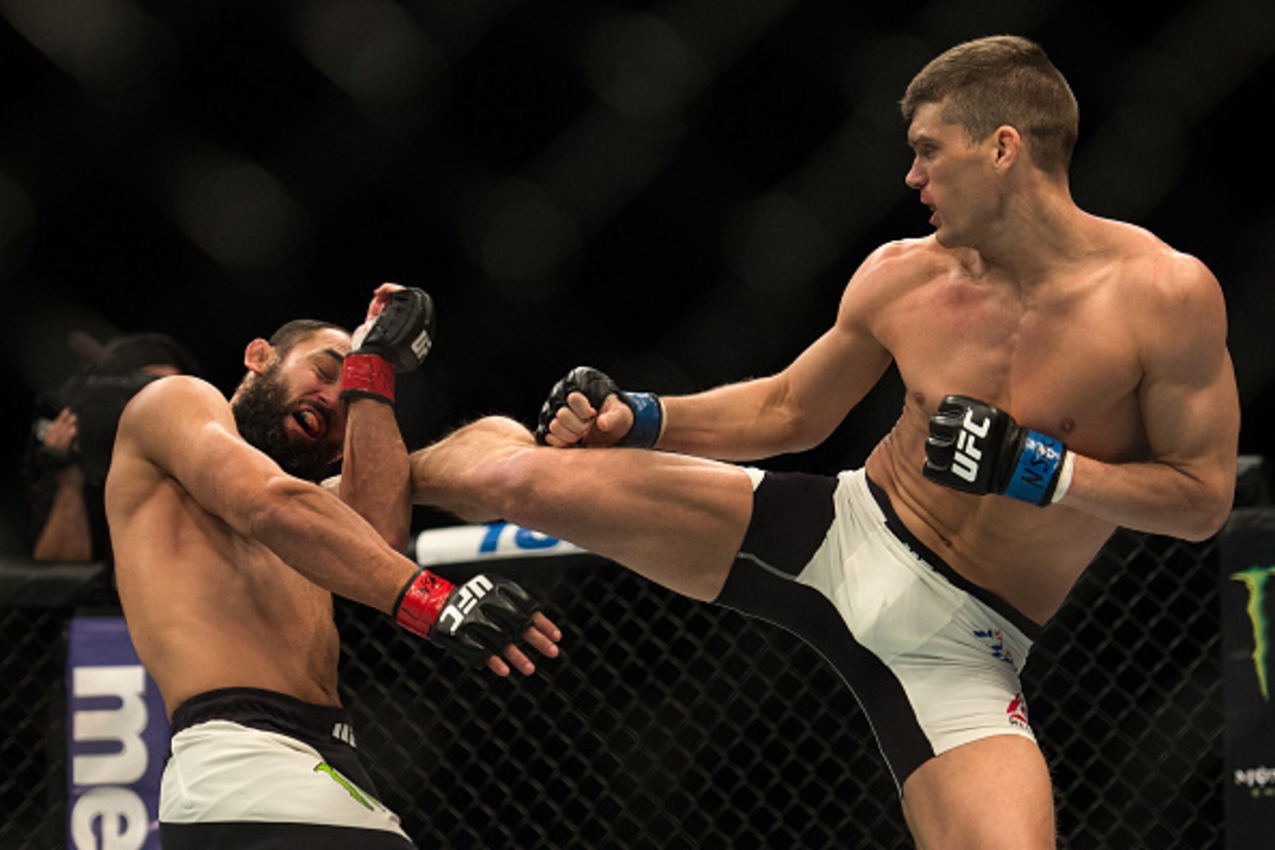LAS VEGAS, NEVADA - FEBRUARY 06:   (R-L) Stephen Thompson kicks Johny Hendricks in their welterweight bout during the UFC Fight Night Las Vegas: Hendricks vs Thompson event inside MGM Grand Garden Arena on February 6, 2016 in Las Vegas Nevada. (Photo by B