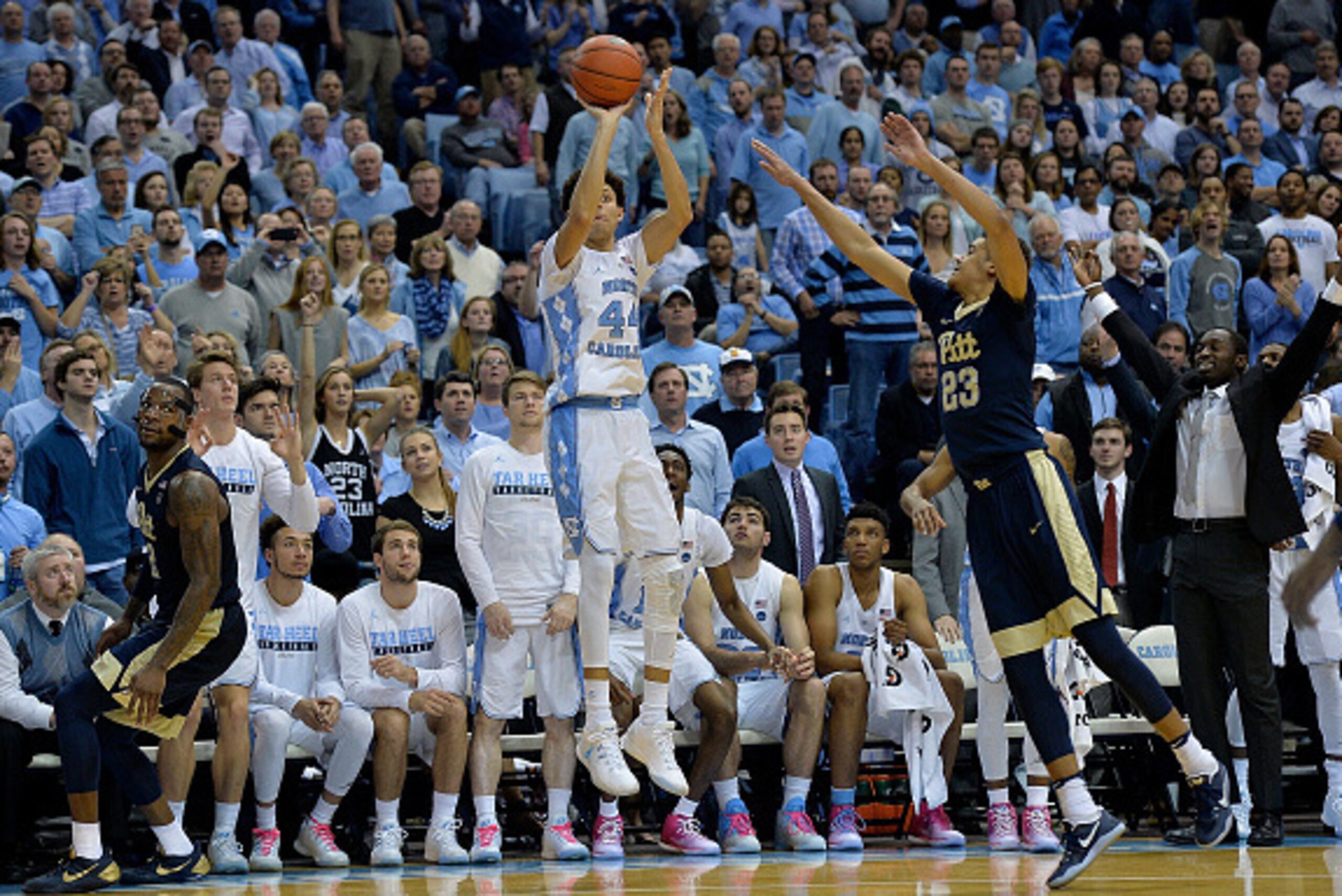 CHAPEL HILL, NC - JANUARY 31:  Justin Jackson #44 of the North Carolina Tar Heels takes a three-point shot against Cameron Johnson #23 of the Pittsburgh Panthers during the game at the Dean Smith Center on January 31, 2017 in Chapel Hill, North Carolina. 