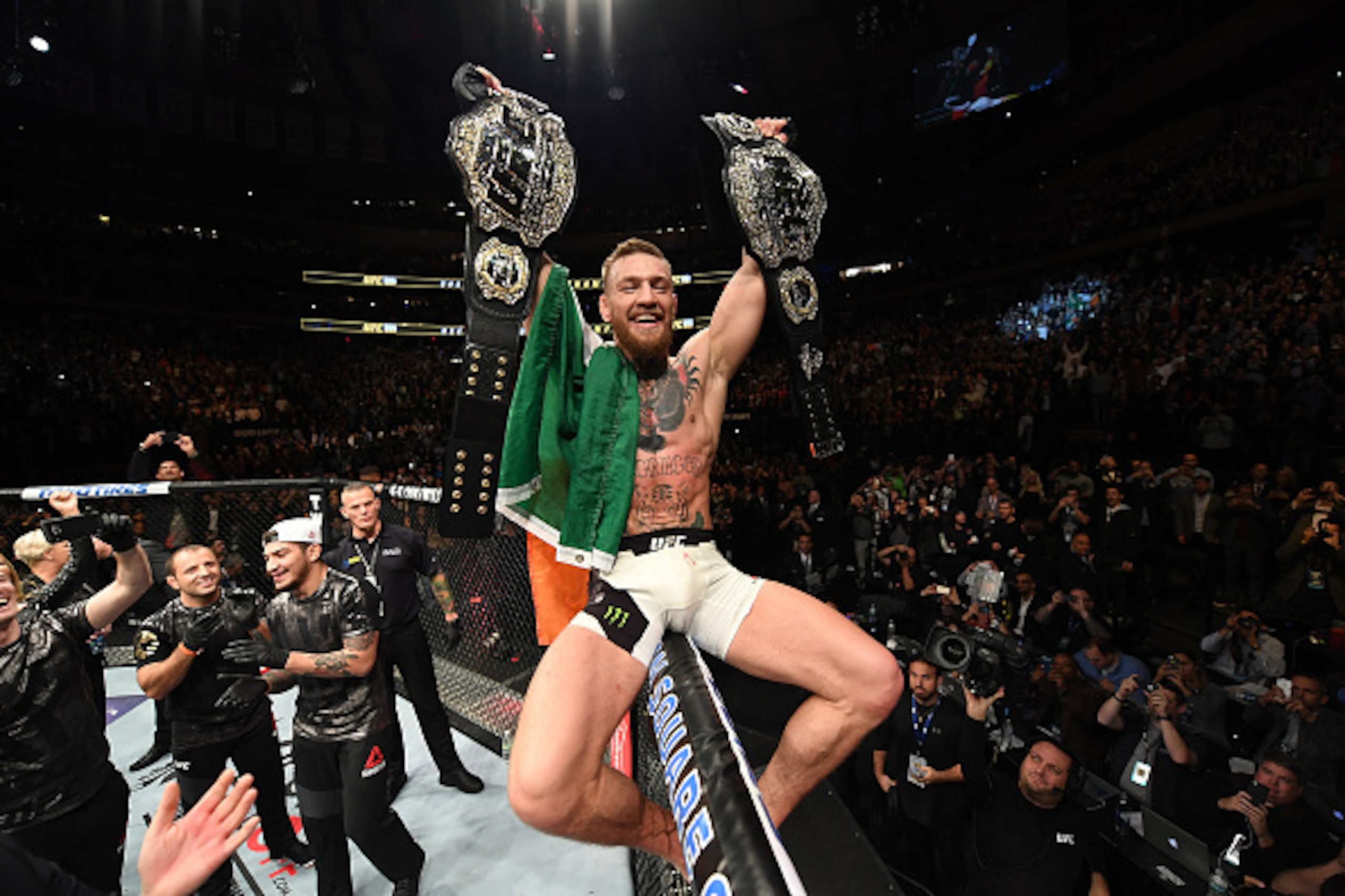 NEW YORK, NY - NOVEMBER 12:  UFC lightweight and featherweight champion Conor McGregor of Ireland celebrates after defeating Eddie Alvarez in their UFC lightweight championship fight during the UFC 205 event at Madison Square Garden on November 12, 2016 i