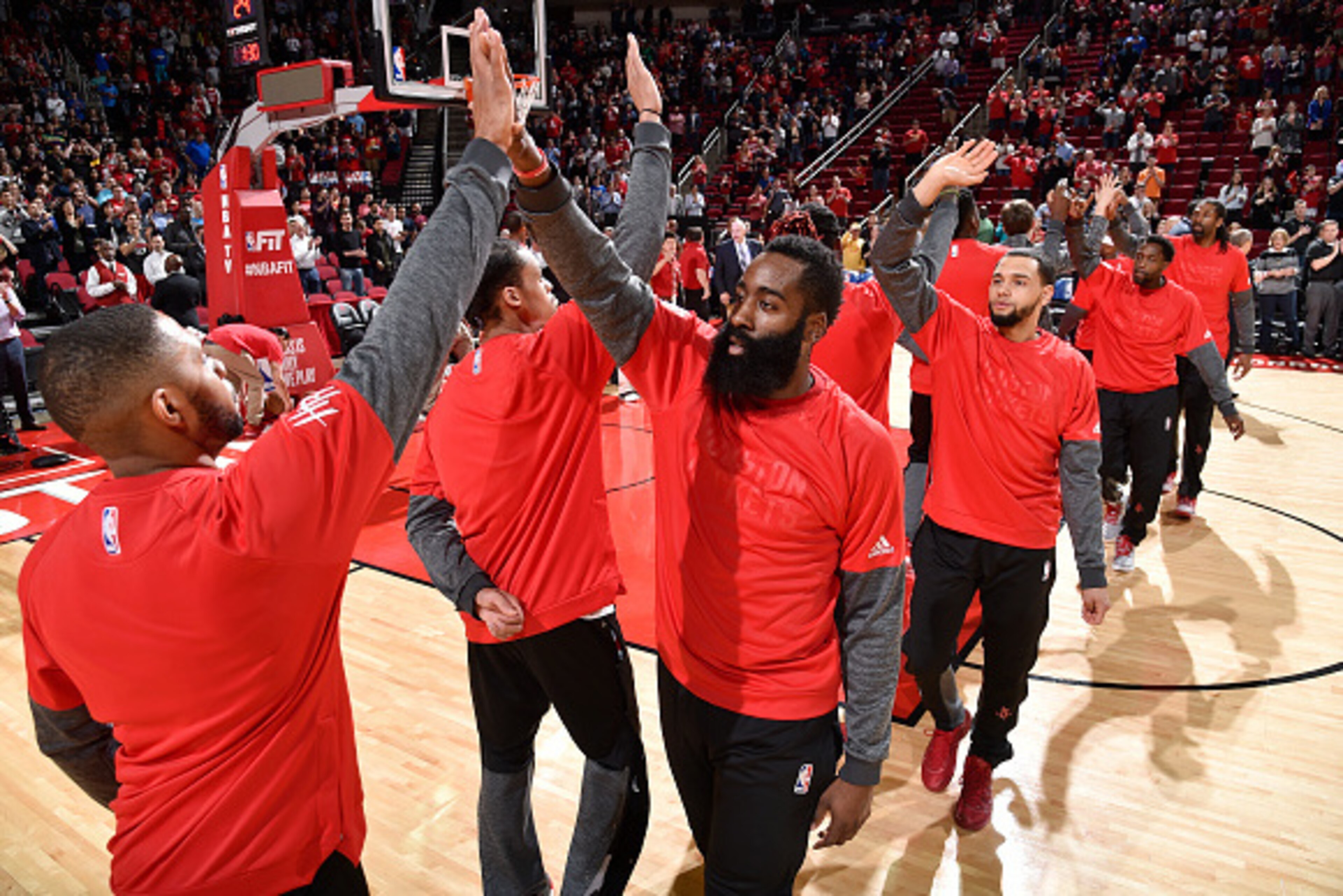 HOUSTON, TX - JANUARY 18:  James Harden #13 of the Houston Rockets shakes hands with his teammates before the game against the Milwaukee Bucks on January 18, 2017 at the Toyota Center in Houston, Texas. NOTE TO USER: User expressly acknowledges and agrees