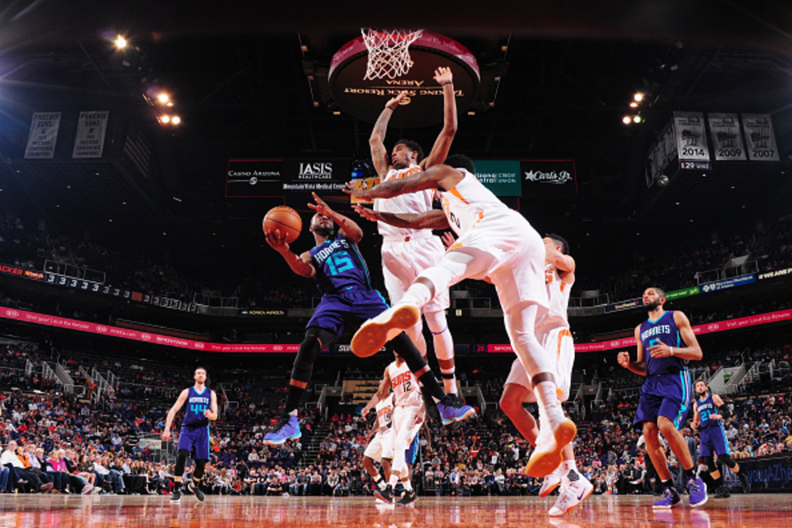 PHOENIX, AZ - MARCH 2: Kemba Walker #15 of the Charlotte Hornets goes for a lay up against the Charlotte Hornets during the game on March 2, 2017 at Talking Stick Resort Arena in Phoenix, Arizona. NOTE TO USER: User expressly acknowledges and agrees that,