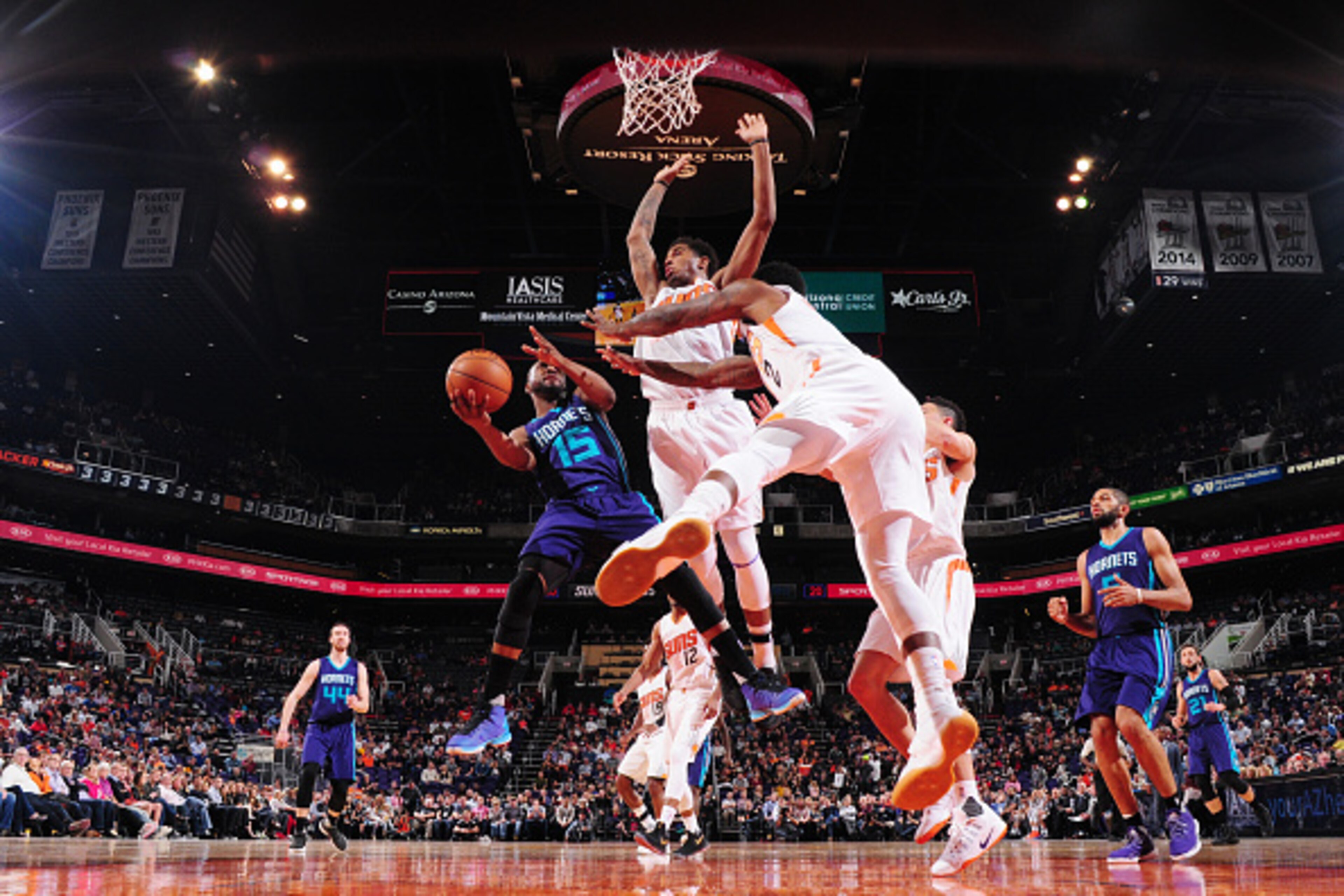 PHOENIX, AZ - MARCH 2: Kemba Walker #15 of the Charlotte Hornets goes for a lay up against the Charlotte Hornets during the game on March 2, 2017 at Talking Stick Resort Arena in Phoenix, Arizona. NOTE TO USER: User expressly acknowledges and agrees that,