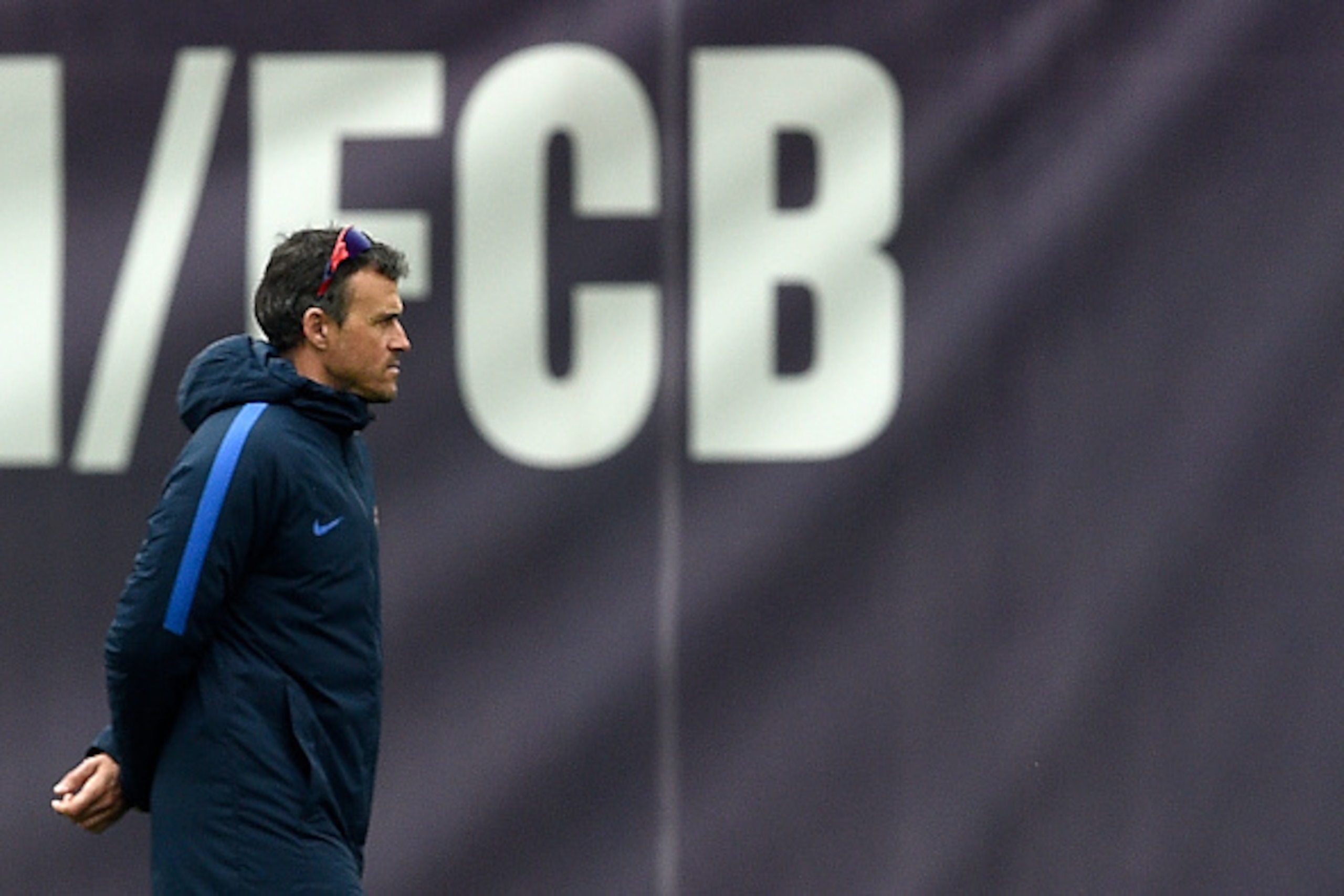Barcelona's coach Luis Enrique stands on the pitch during a training session at the Sports Center FC Barcelona Joan Gamper in Sant Joan Despi, near Barcelona on March 3, 2017 / AFP PHOTO / LLUIS GENE        (Photo credit should read LLUIS GENE/AFP/Getty I