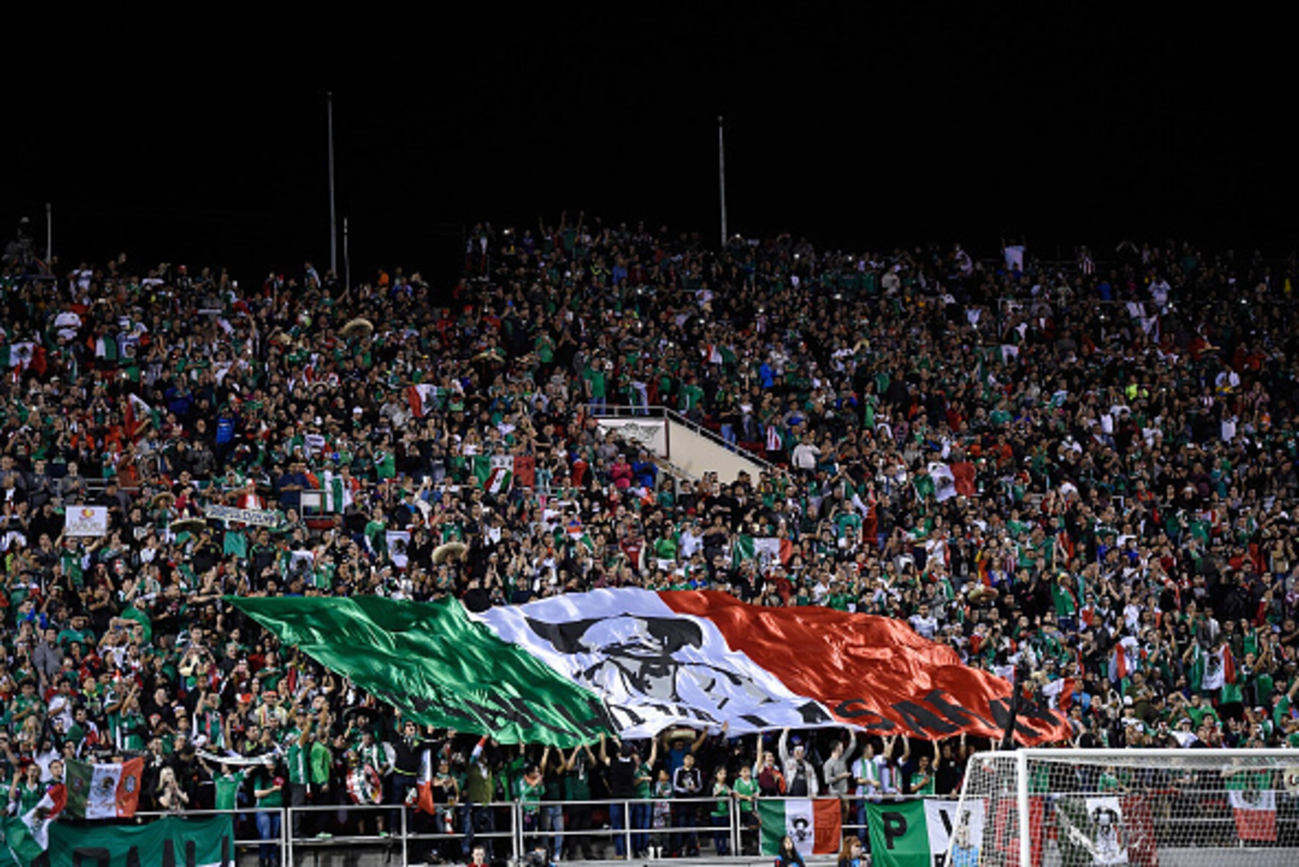 LAS VEGAS, NV - FEBRUARY 08:  Mexico fans wave a flag before the start of an exhibition match between Mexico and Iceland at Sam Boyd Stadium on February 8, 2017 in Las Vegas, Nevada. Mexico won 1-0.  (Photo by David J. Becker/Getty Images)