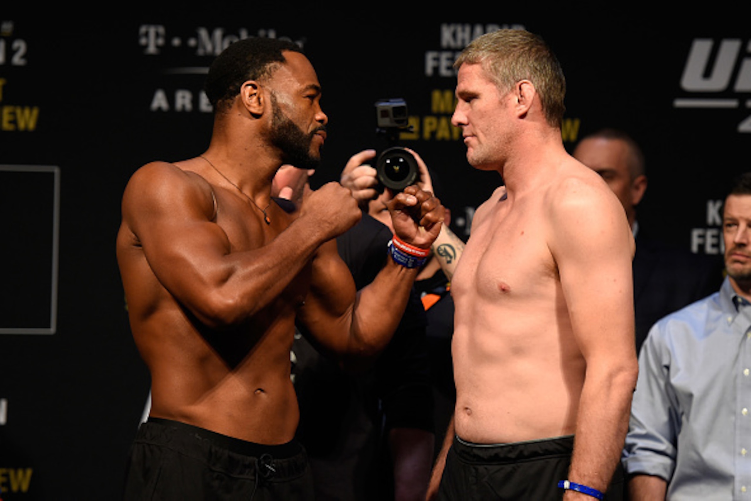 LAS VEGAS, NV - MARCH 03: (L-R) Rashad Evans and Daniel Kelly of Australia face off during the UFC 209 weigh-in at T-Mobile arena on March 3, 2017 in Las Vegas, Nevada. (Photo by Josh Hedges/Zuffa LLC/Zuffa LLC via Getty Images) LAS VEGAS, NV - MARCH 03: (L-R) Rashad Evans and Daniel Kelly of Australia face off during the UFC 209 weigh-in at T-Mobile arena on March 3, 2017 in Las Vegas, Nevada. (Photo by Josh Hedges/Zuffa LLC/Zuffa LLC via Getty Images)