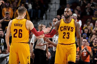 CLEVELAND, OH - FEBRUARY 27:  LeBron James #23 and Kyle Korver #26 of the Cleveland Cavaliers high-five during a game against the Milwaukee Bucks on February 27, 2017 at Quicken Loans Arena in Cleveland, Ohio. NOTE TO USER: User expressly acknowledges and