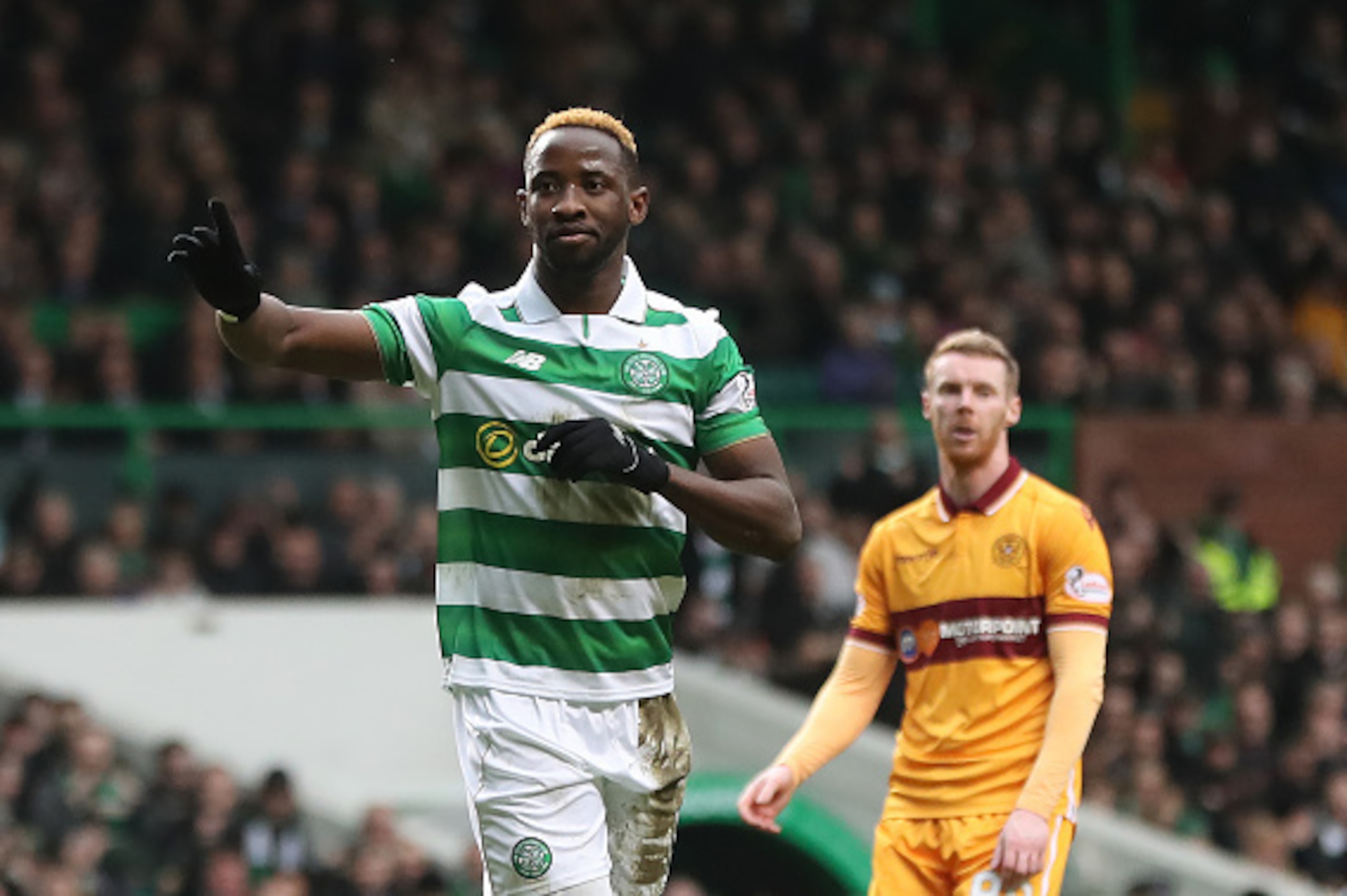 GLASGOW, SCOTLAND - FEBRUARY 18: Moussa Dembele of Celtic  celebrates after he scores the opening goal from the penalty spot during the Ladbrokes Scottish Premiership match between Celtic and  Motherwell at Celtic Park on February 18, 2017 in Glasgow, Sco