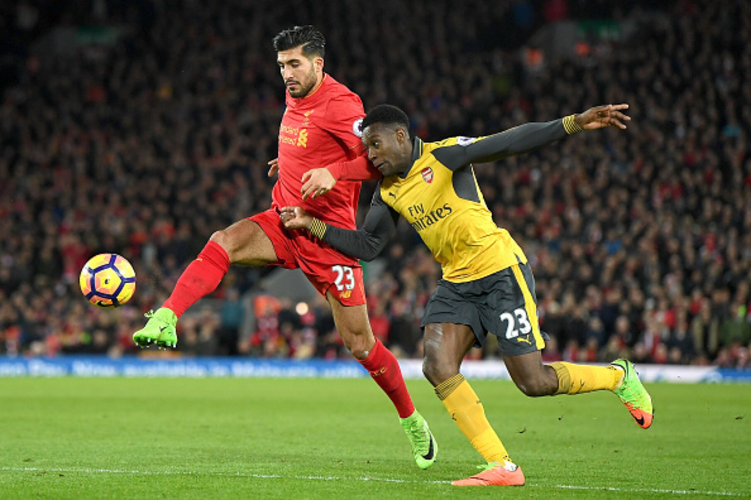 LIVERPOOL, ENGLAND - MARCH 04:  Emre Can of Liverpool (L) and Danny Welbeck of Arsenal (R) battle for possession during the Premier League match between Liverpool and Arsenal at Anfield on March 4, 2017 in Liverpool, England.  (Photo by Laurence Griffiths