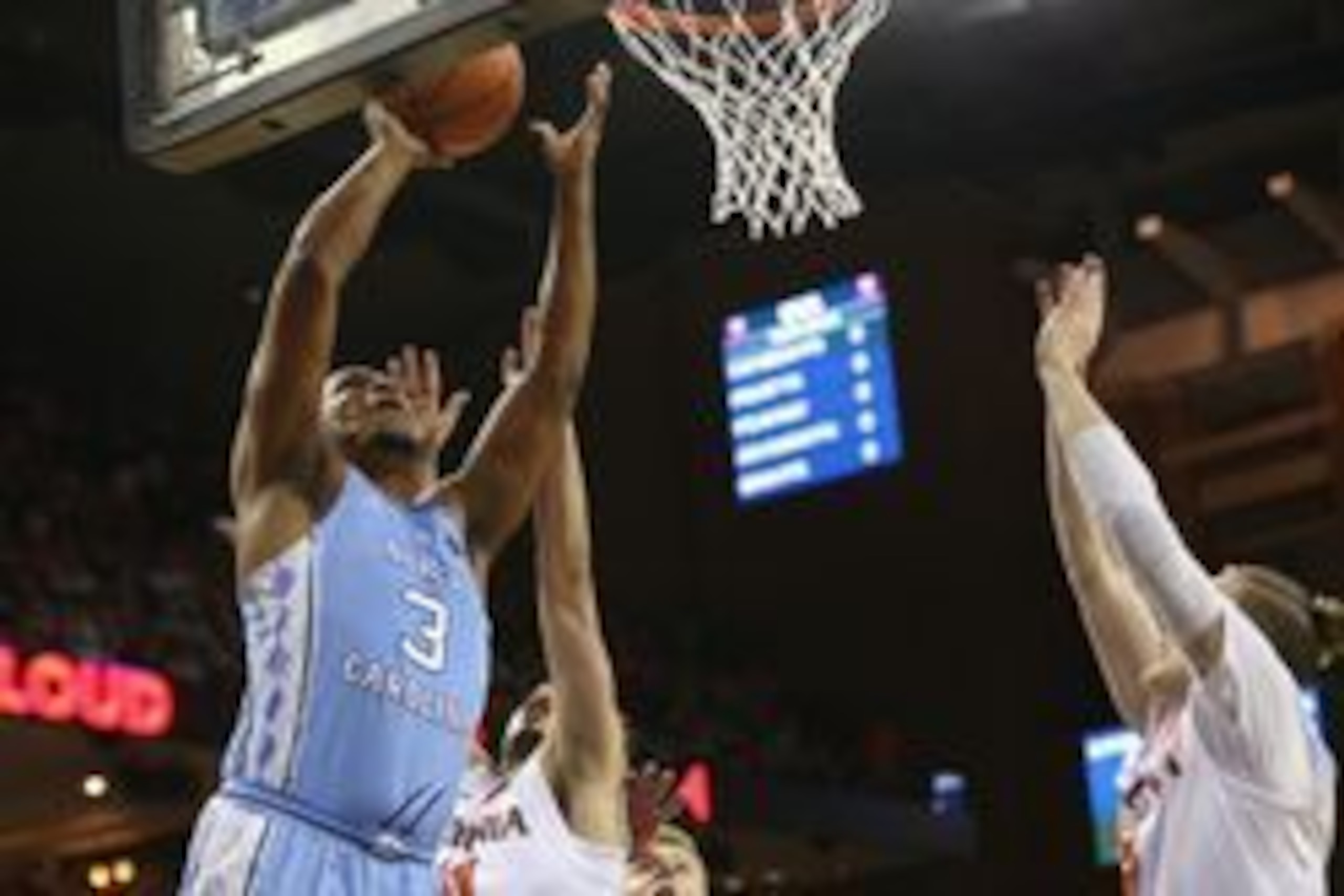 Feb 27, 2017; Charlottesville, VA, USA; North Carolina Tar Heels forward Kennedy Meeks (3) shoots the ball as Virginia Cavaliers guard Ty Jerome (11) and guard Kyle Guy (5) defend in the first half at John Paul Jones Arena. The Cavaliers won 53-43. Mandat
