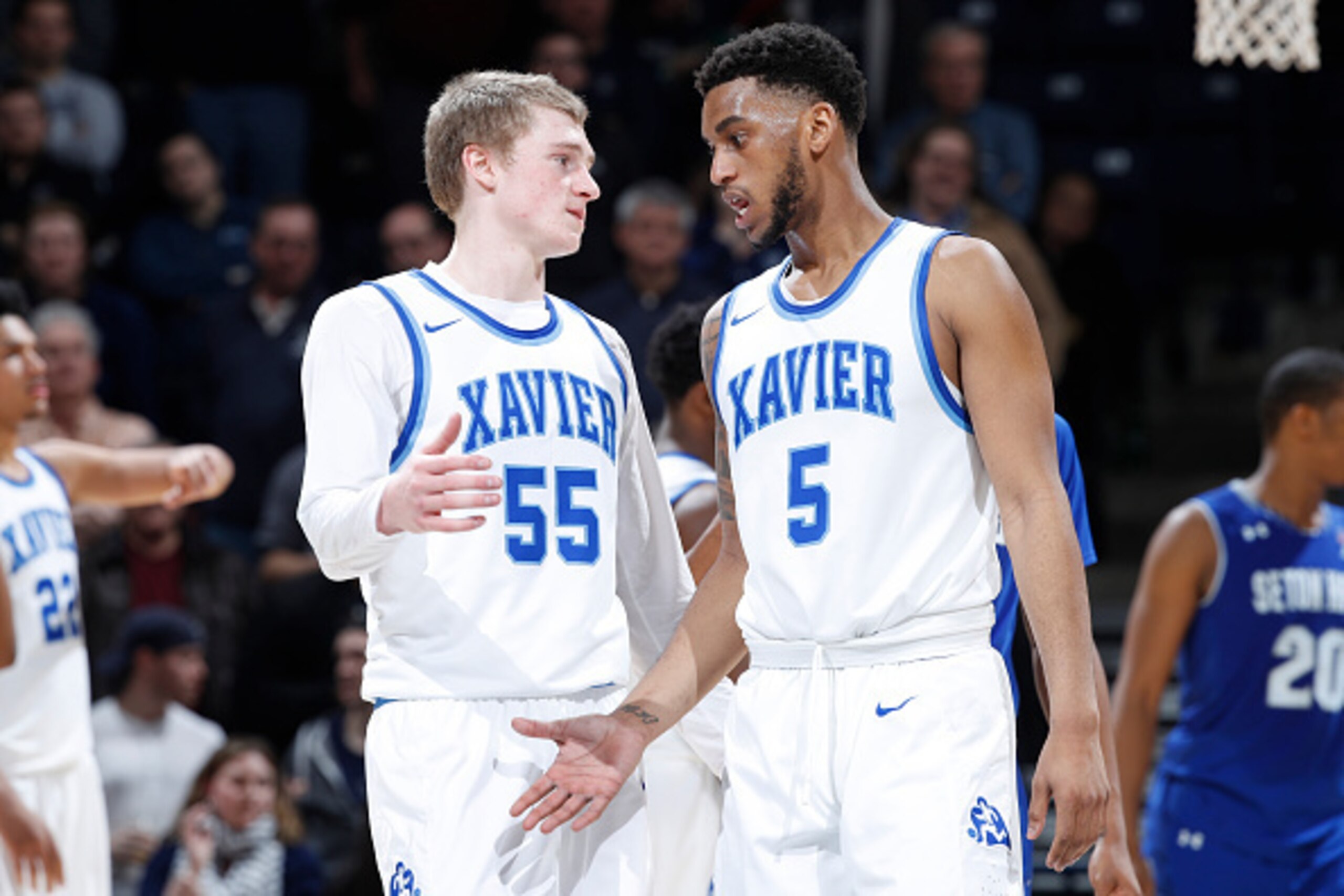 CINCINNATI, OH - FEBRUARY 01: Trevon Bluiett #5 and J.P. Macura #55 of the Xavier Musketeers look on against the Seton Hall Pirates during the game at Cintas Center on February 1, 2017 in Cincinnati, Ohio. Xavier defeated Seton Hall 72-70. (Photo by Joe R