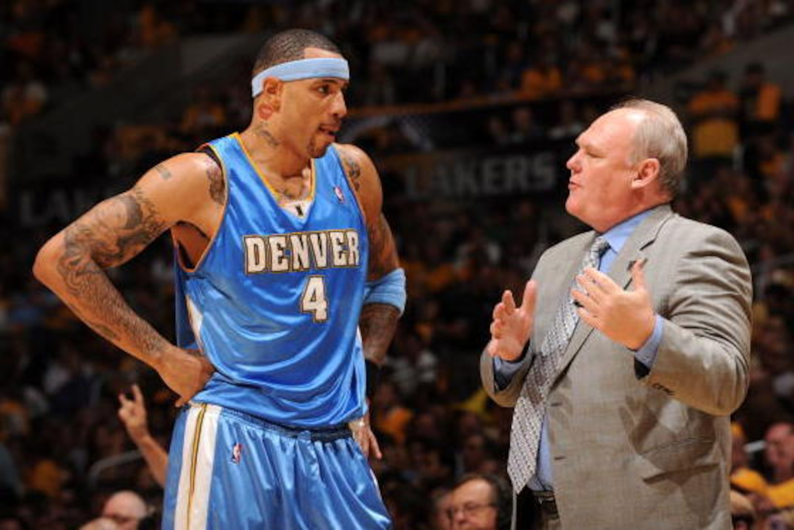 LOS ANGELES - MAY 19:  Kenyon Martin #4 of the Denver Nuggets receives instruction from Head Coach George Karl while taking on the Los Angeles Lakers in Game One of the Western Conference Finals during the 2009 NBA Playoffs at Staples Center on May 19, 20