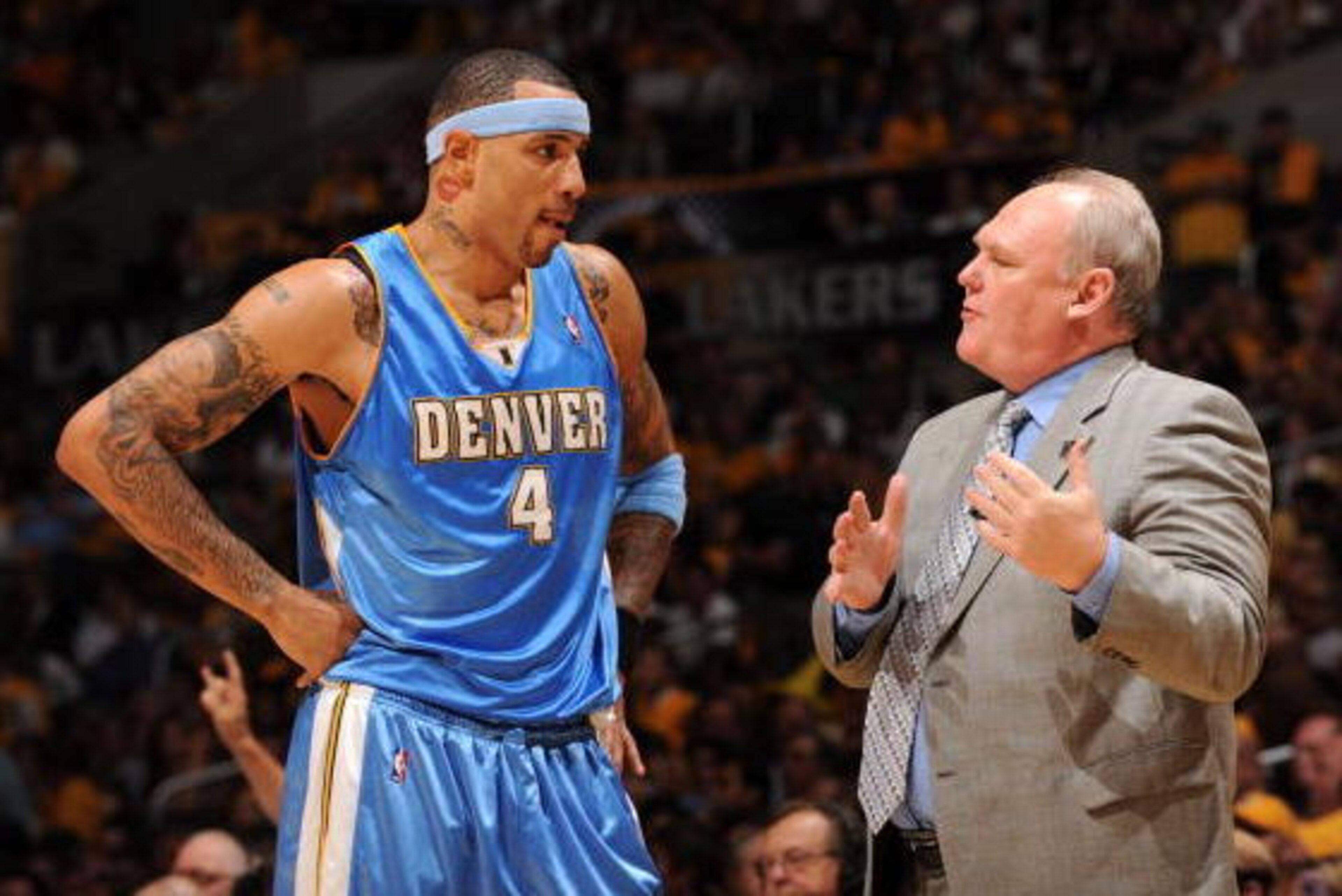 LOS ANGELES - MAY 19:  Kenyon Martin #4 of the Denver Nuggets receives instruction from Head Coach George Karl while taking on the Los Angeles Lakers in Game One of the Western Conference Finals during the 2009 NBA Playoffs at Staples Center on May 19, 20