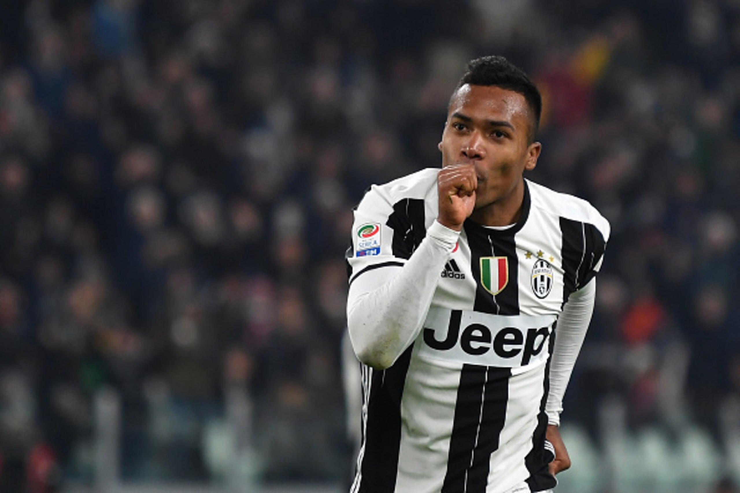 TURIN, ITALY - FEBRUARY 25:  Alex Sandro of Juventus FC celebrates a goal during the Serie A match between Juventus FC and Empoli FC at Juventus Stadium on February 25, 2017 in Turin, Italy.  (Photo by Valerio Pennicino/Getty Images)