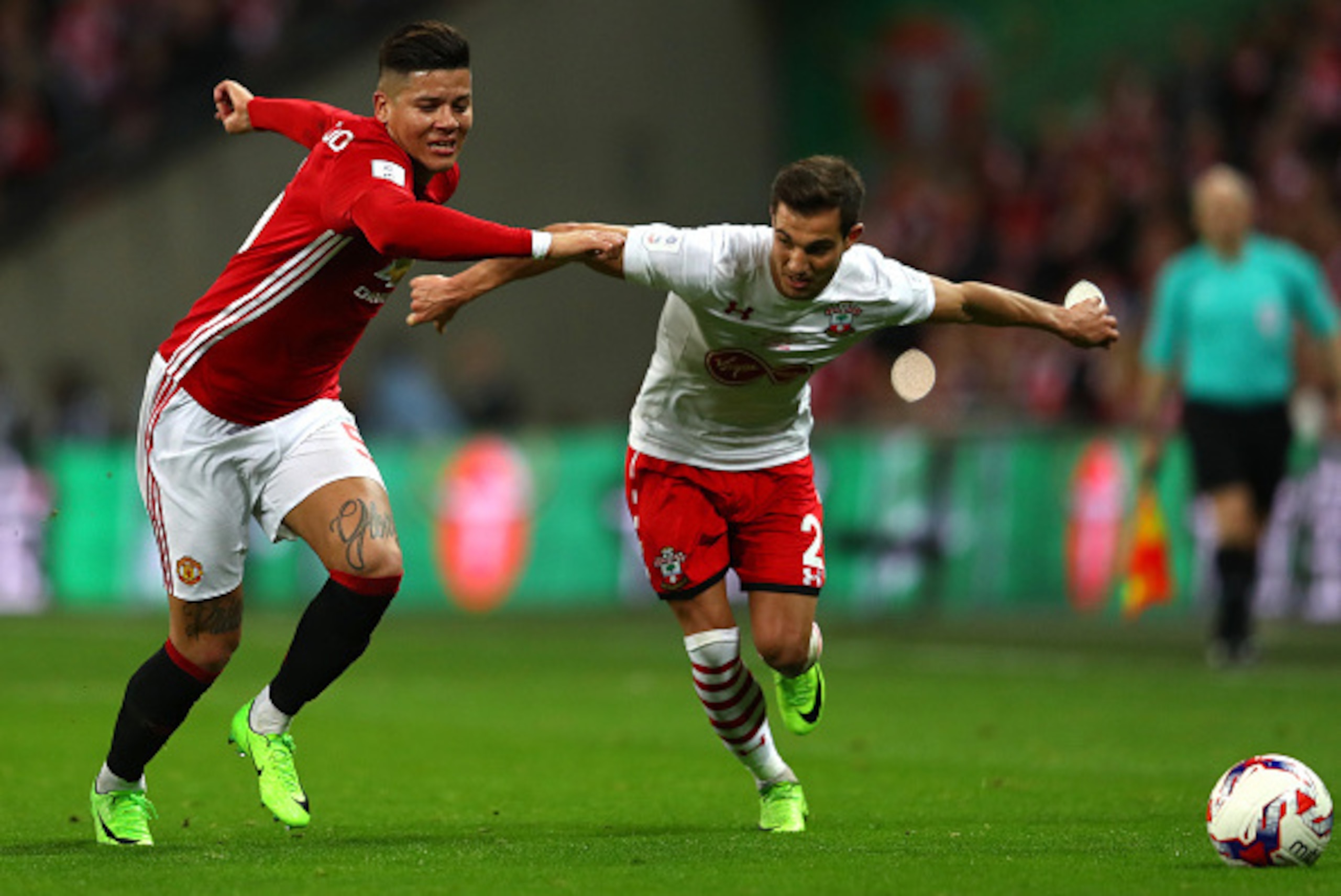 LONDON, ENGLAND - FEBRUARY 26:  Cedric Soares of Southampton and Marcos Rojo of Manchester United battle for the ball during the EFL Cup Final match between Manchester United and Southampton at Wembley Stadium on February 26, 2017 in London, England.  (Ph
