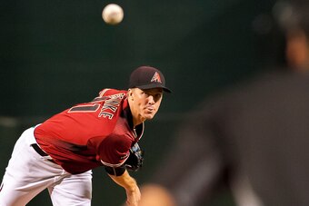 PHOENIX, AZ - SEPTEMBER 11: Starting pitcher Zack Greinke #21 of the Arizona Diamondbacks warms up in the first inning of the MLB game against the San Francisco Giants at Chase Field on September 11, 2016 in Phoenix, Arizona. The San Francisco Giants defe