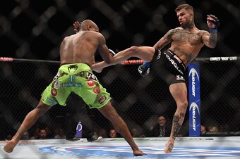 Cody Garbrandt kicks Marcus Brimage in their bantamweight bout during the UFC 182 event at the MGM Grand Garden Arena on January 3, 2015, in Las Vegas.