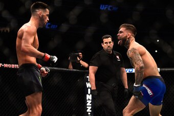 Cody Garbrandt taunts Dominick Cruz in their UFC bantamweight championship bout during the UFC 207 event at T-Mobile Arena on December 30, 2016, in Las Vegas.