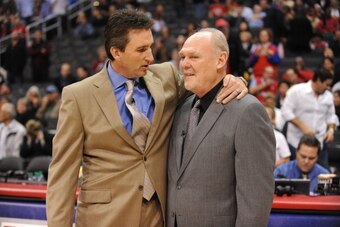 LOS ANGELES, CA - FEBRUARY 2:  Head Coach George Karl of the Denver Nuggets (R) is greeted by Head Coach Vinny Del Negro of the Los Angeles Clippers before their game at Staples Center on February 2, 2012 in Los Angeles, California. NOTE TO USER: User exp