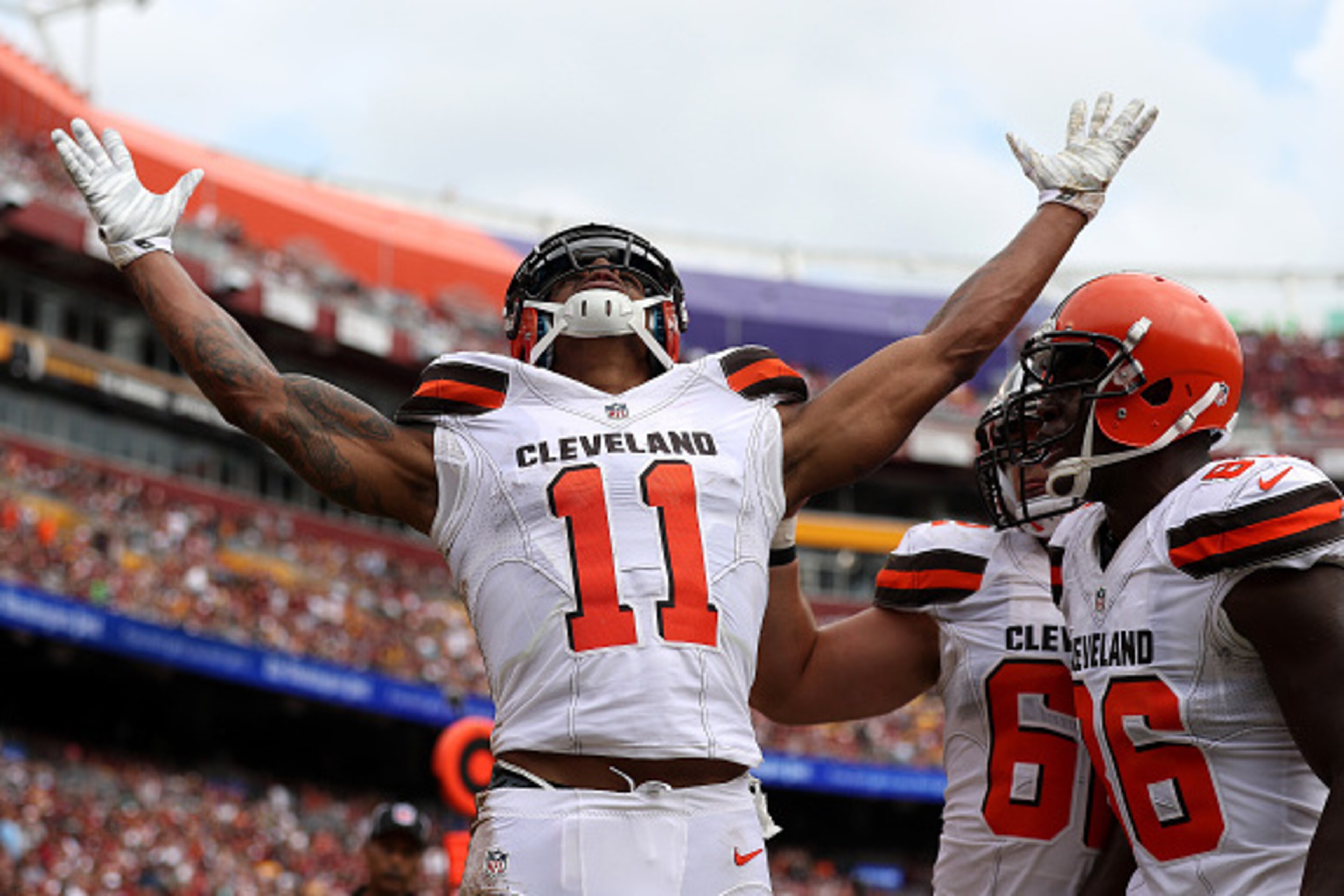 LANDOVER, MD - OCTOBER 2: Wide receiver Terrelle Pryor #11 of the Cleveland Browns celebrates with teammate tight end Randall Telfer #86 after scoring a second quarter touchdown against the Washington Redskins at FedExField on October 2, 2016 in Landover,