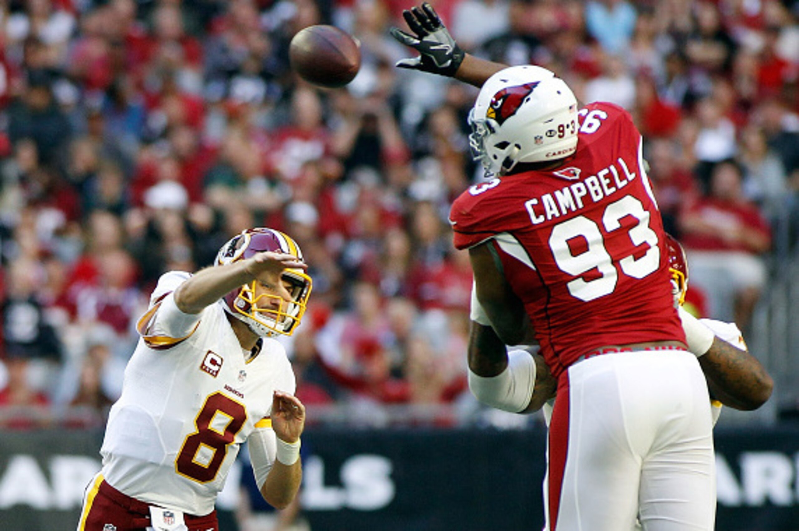 GLENDALE, AZ - DECEMBER 04:  Calais Campbell #93 of the Arizona Cardinals leaps to block the pass of quarterback Kurk Cousins #8 of the Washington Redskins during the first quarter of a game at University of Phoenix Stadium on December 4, 2016 in Glendale