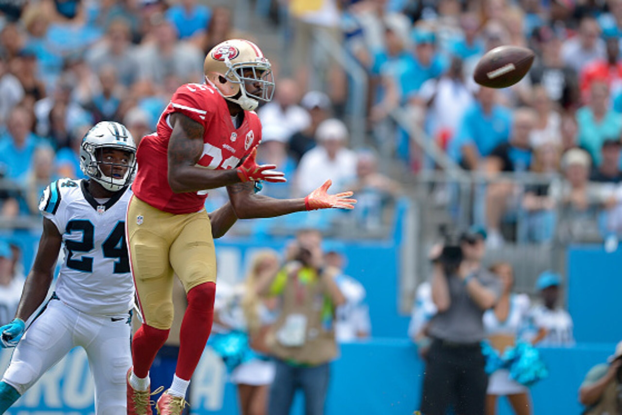 CHARLOTTE, NC - SEPTEMBER 18:  Torrey Smith #82 of the San Francisco 49ers makes a touchdown catch against James Bradberry #24 of the Carolina Panthers during the game at Bank of America Stadium on September 18, 2016 in Charlotte, North Carolina.  (Photo 